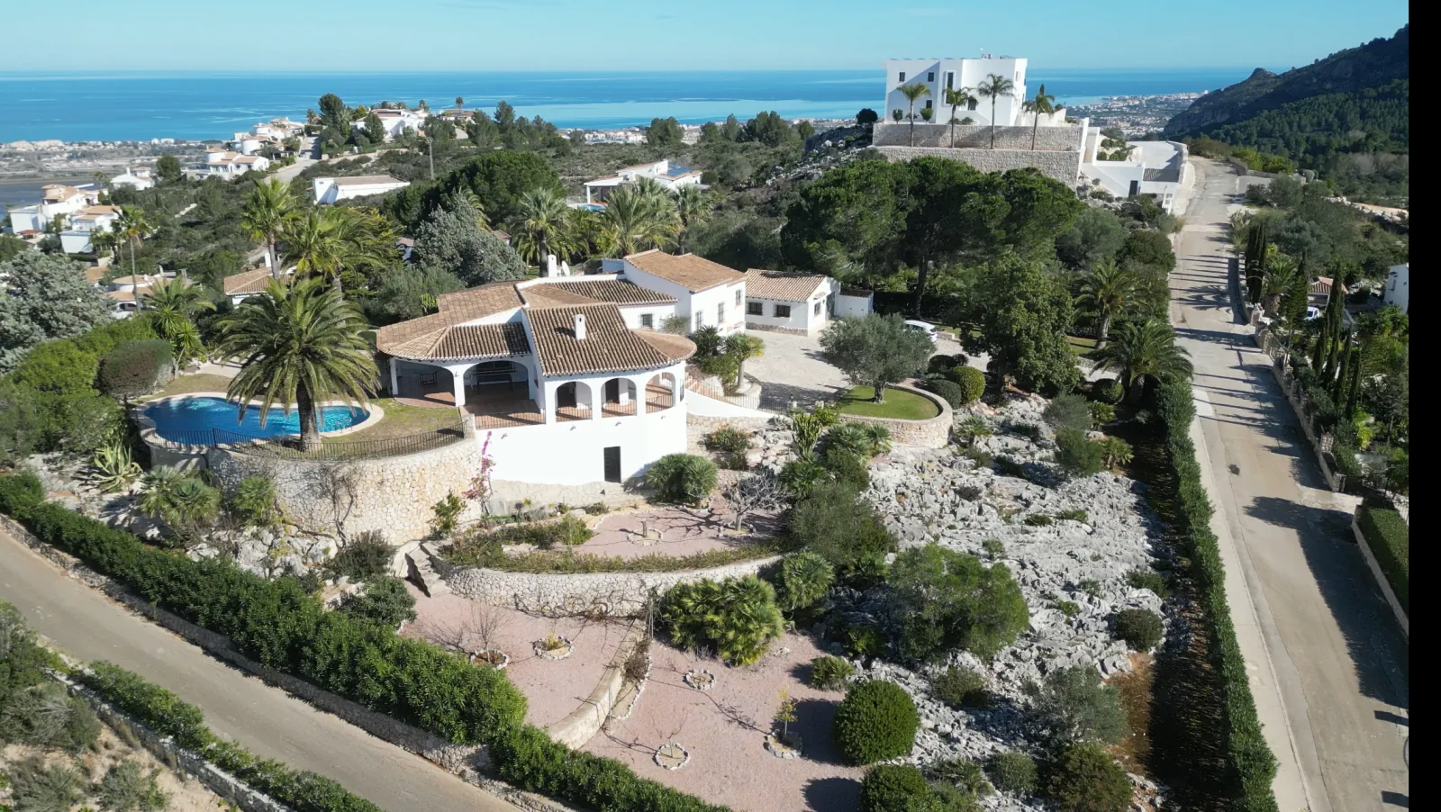 Villa exclusive de style finca avec vue panoramique à couper le souffle, piscine et jardin luxuriant sur le Monte Pego