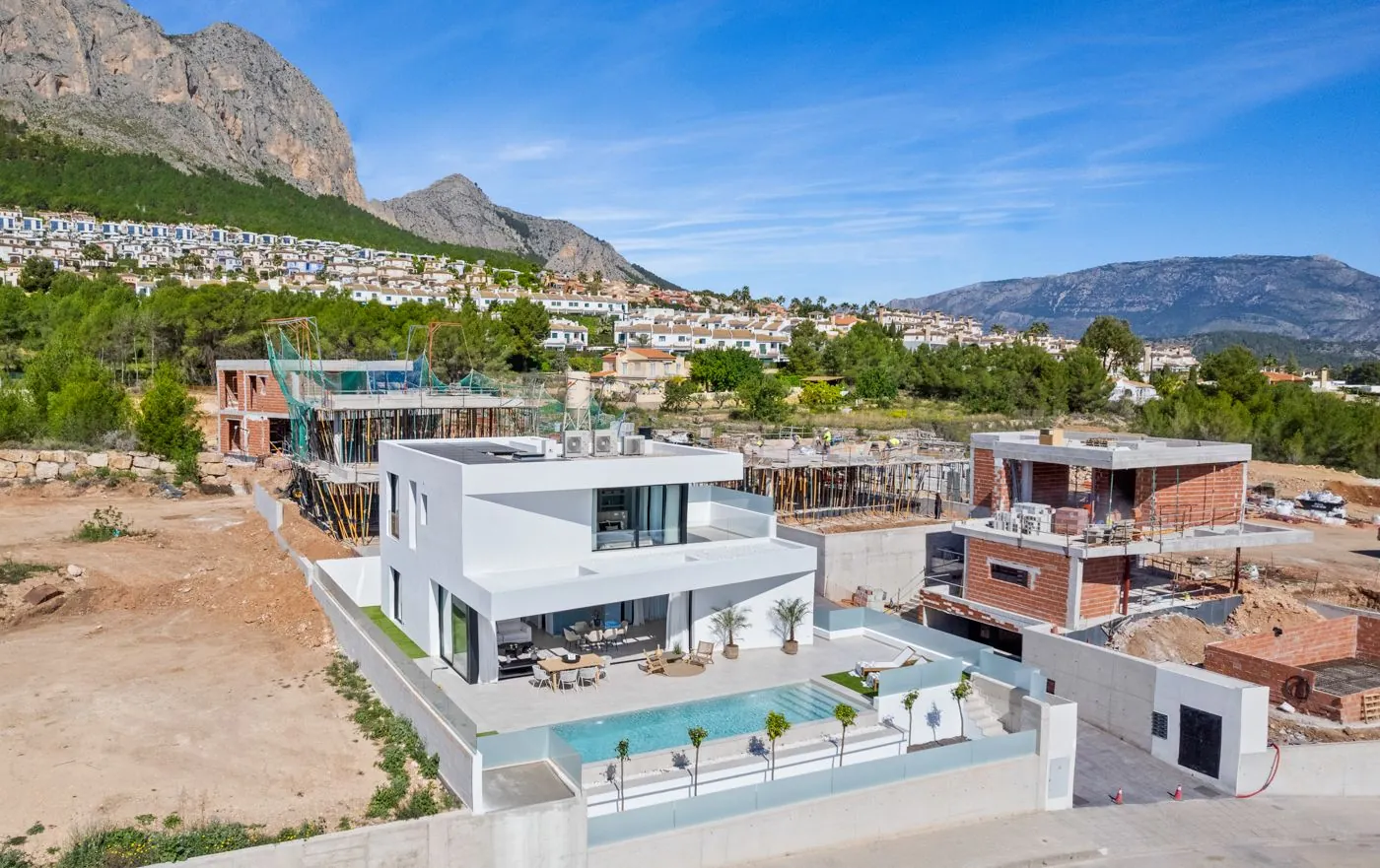 Contemporary newly built villas surrounded by mountains in Polop de la Marina.