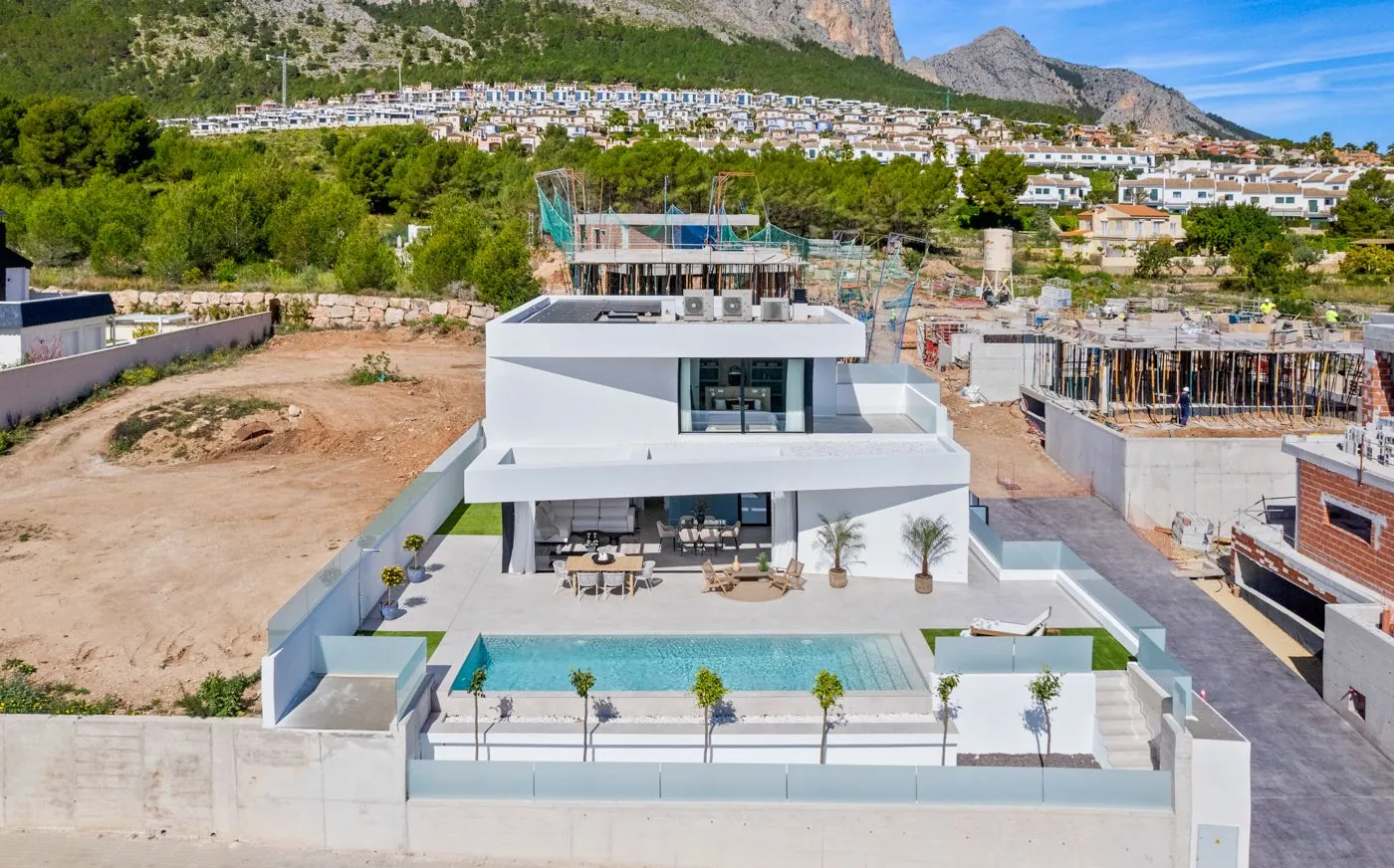 Contemporary newly built villas surrounded by mountains in Polop de la Marina.