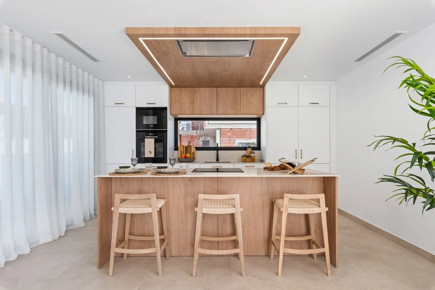 Contemporary newly built villas surrounded by mountains in Polop de la Marina.