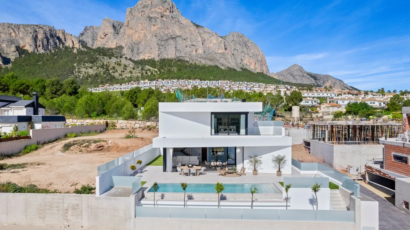 Contemporary newly built villas surrounded by mountains in Polop de la Marina.