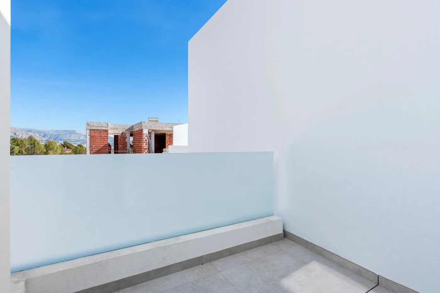 Contemporary newly built villas surrounded by mountains in Polop de la Marina.