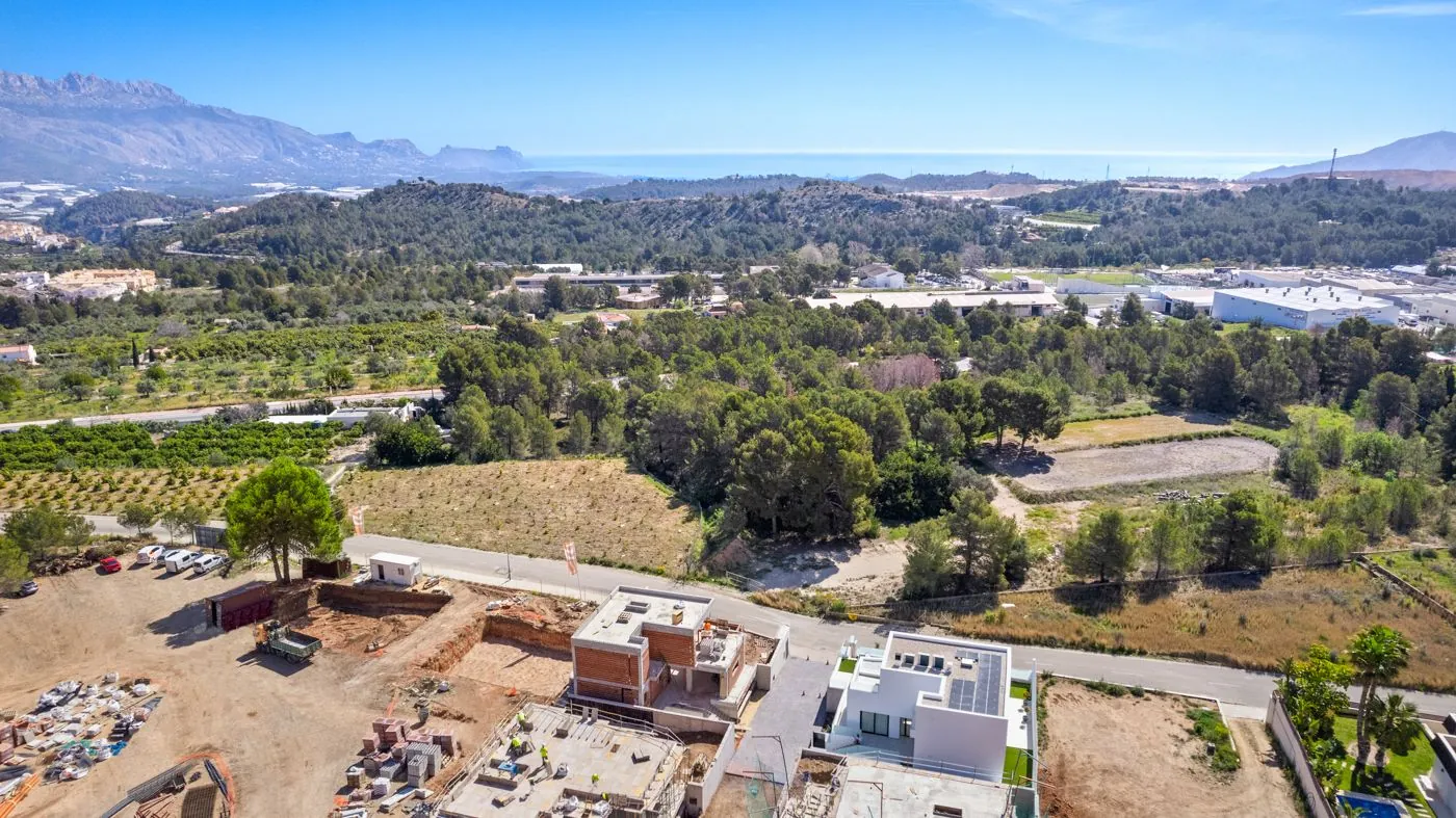 Contemporary newly built villas surrounded by mountains in Polop de la Marina.