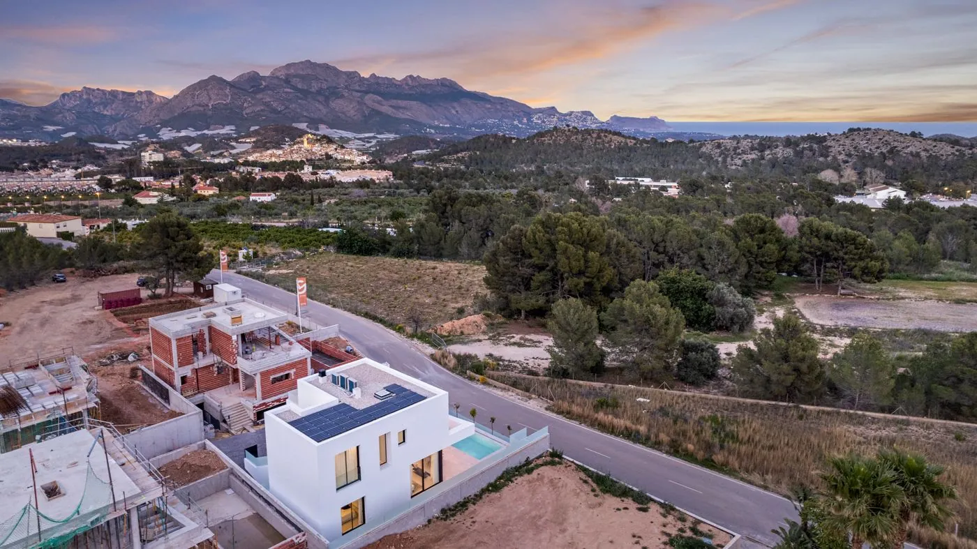 Contemporary newly built villas surrounded by mountains in Polop de la Marina.