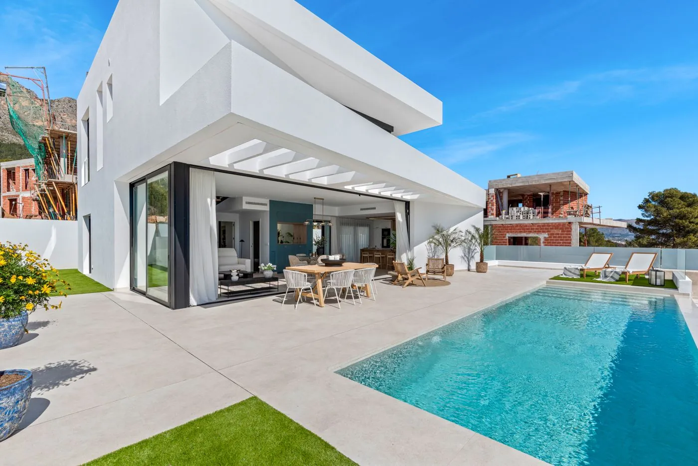 Contemporary newly built villas surrounded by mountains in Polop de la Marina.