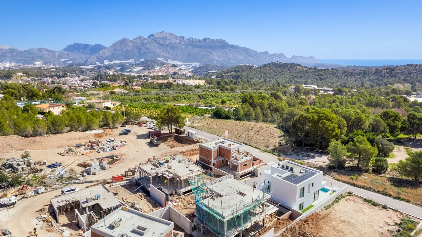 Contemporary newly built villas surrounded by mountains in Polop de la Marina.