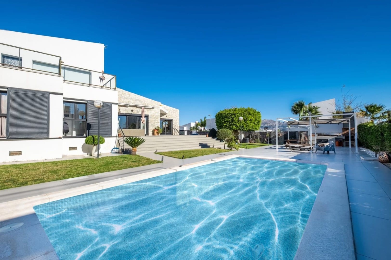 Modern villa with heated pool, cinema room, and sauna for sale in Polop.