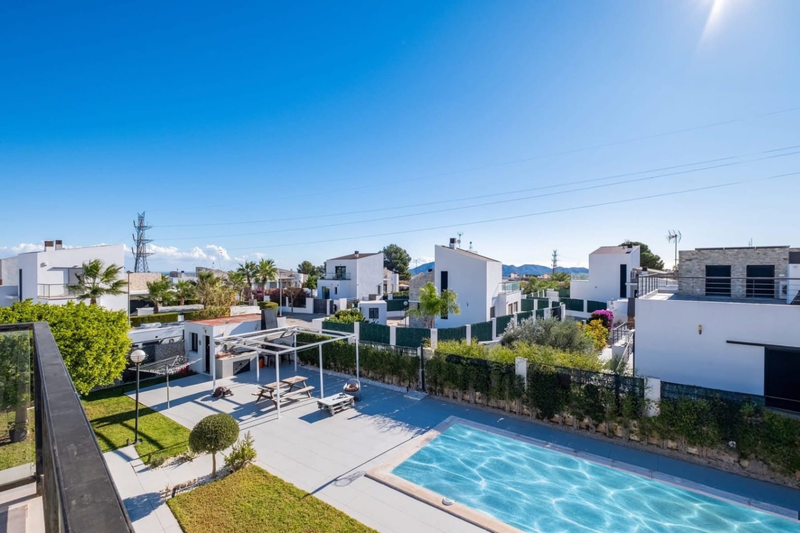 Modern villa with heated pool, cinema room, and sauna for sale in Polop.
