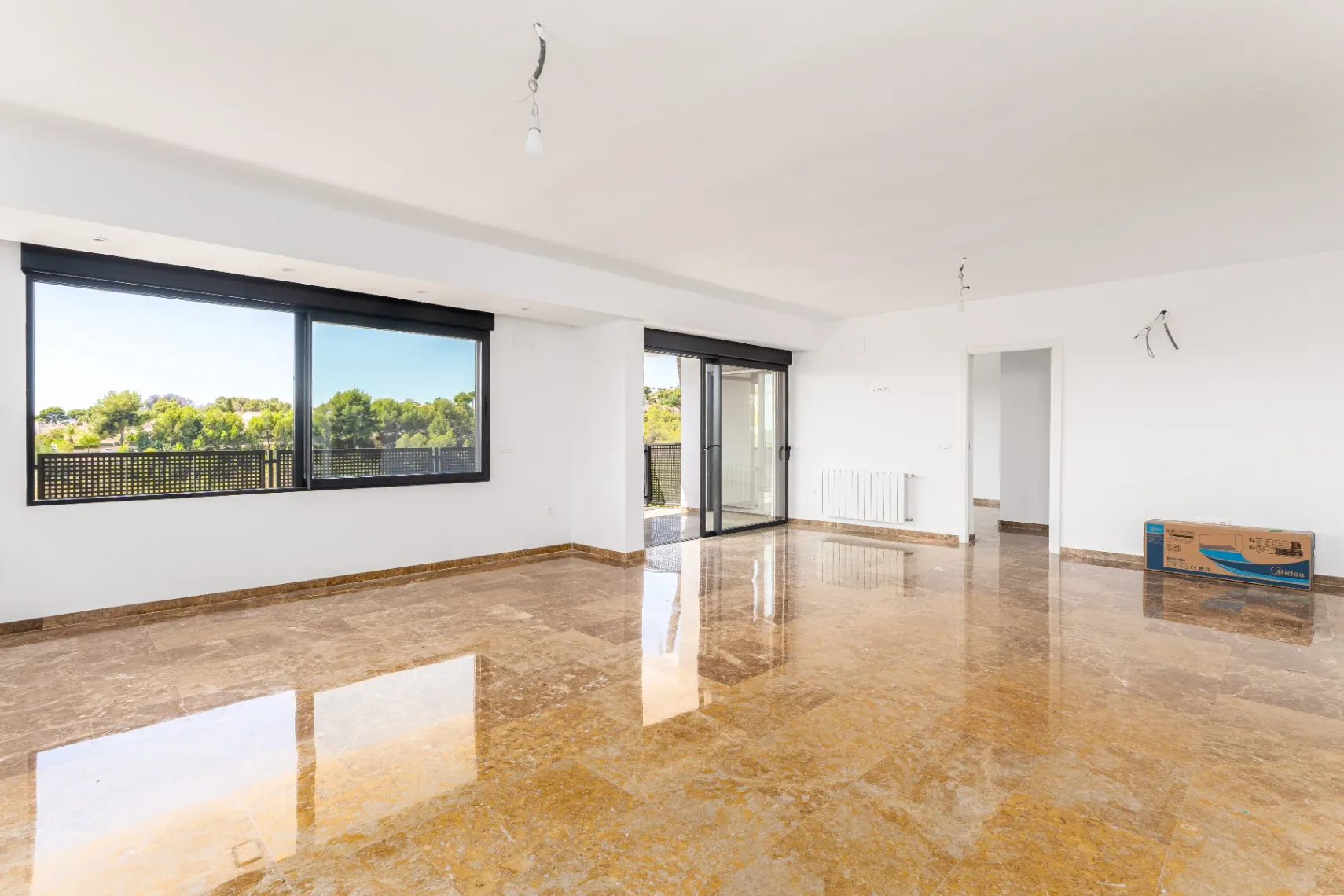 Modern and spacious villa for sale in La Nucía with large land and views.