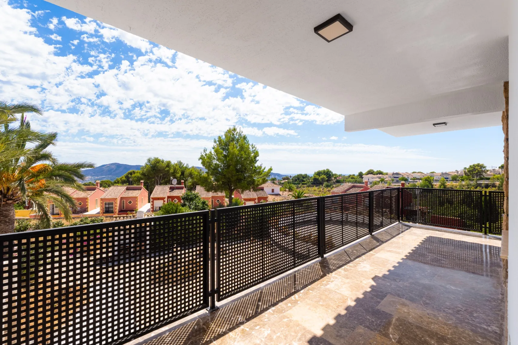 Modern and spacious villa for sale in La Nucía with large land and views.