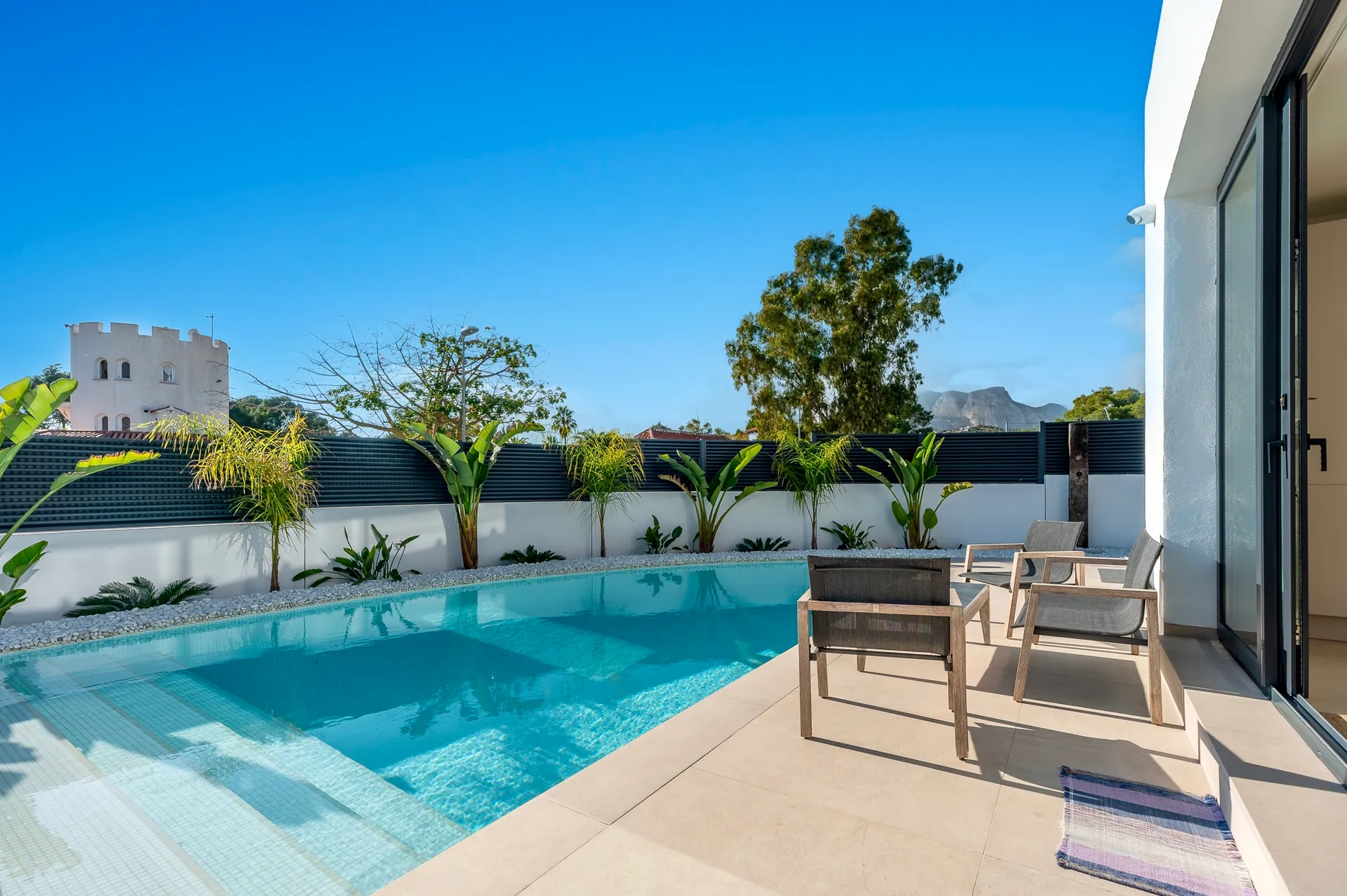 Modern new-build villa for sale in La Nucía with pool and garden.