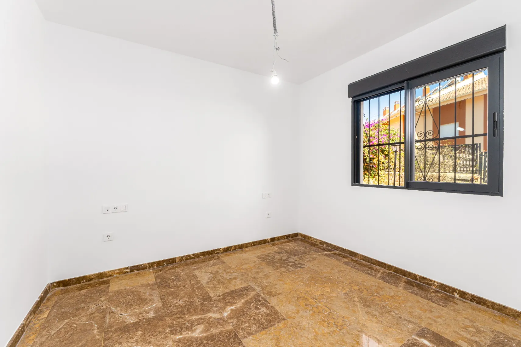 Modern and spacious villa for sale in La Nucía with large land and views.