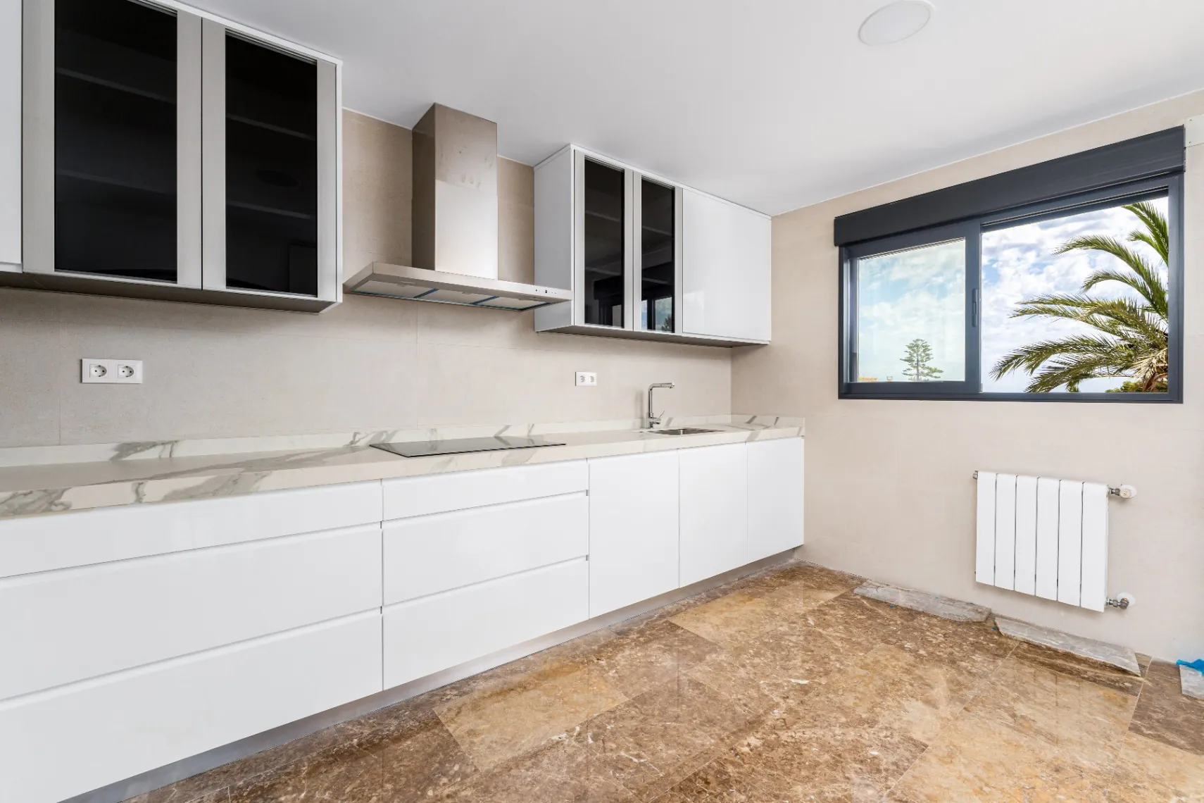 Modern and spacious villa for sale in La Nucía with large land and views.