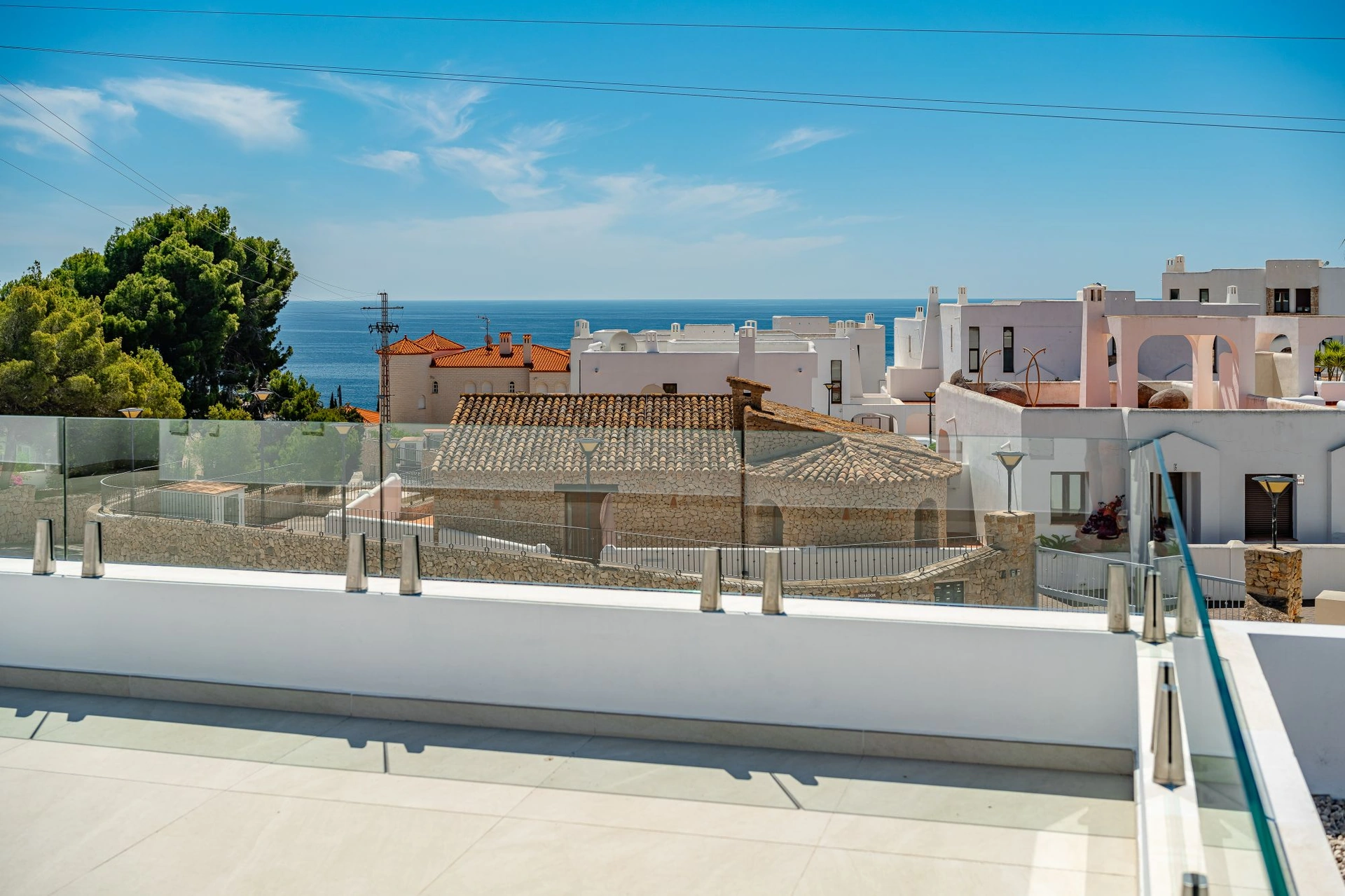 Luxury villa inspired by Ibiza with sea views and a rooftop oasis for sale in Calpe.