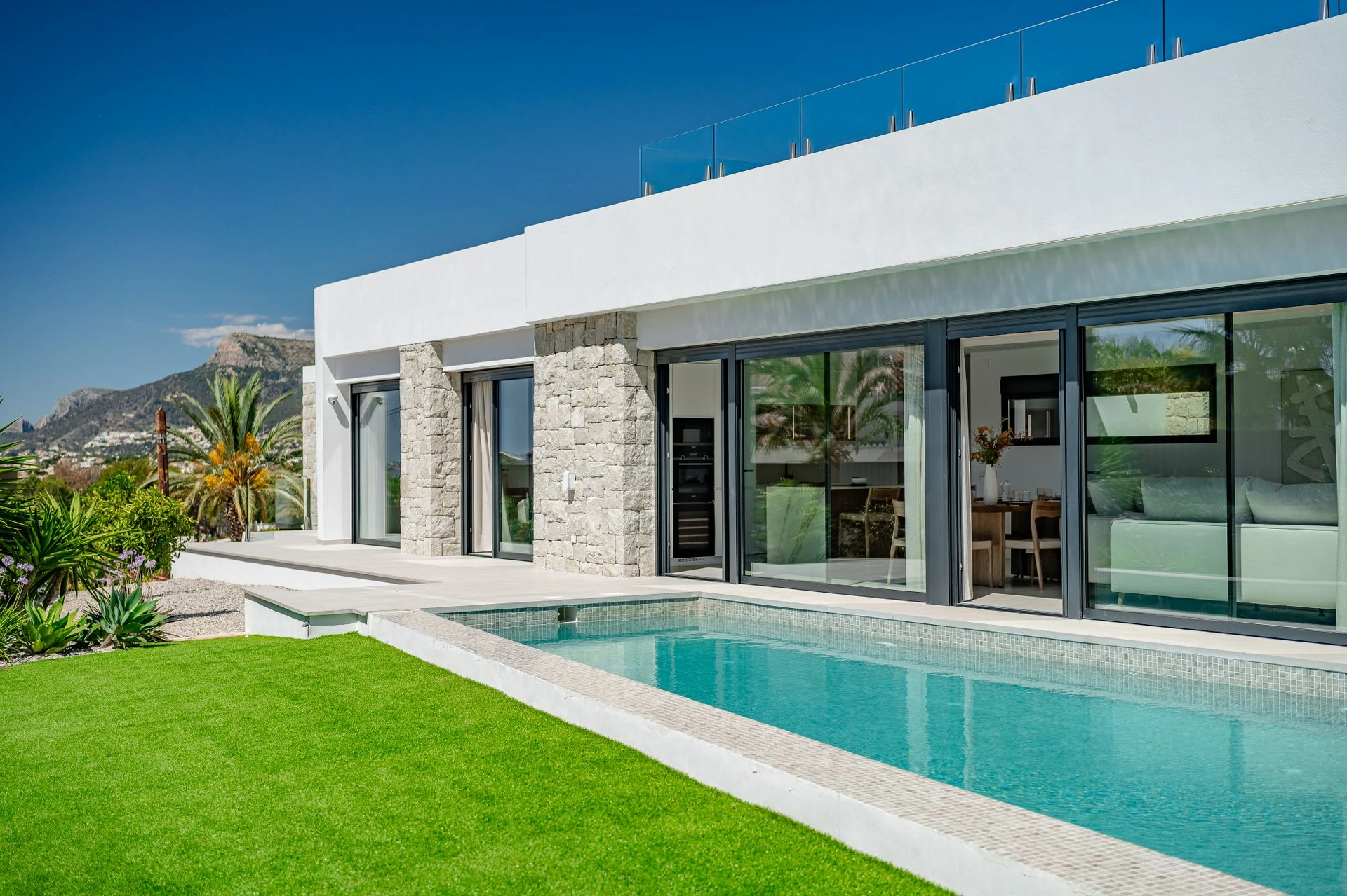 Luxury villa inspired by Ibiza with sea views and a rooftop oasis for sale in Calpe.