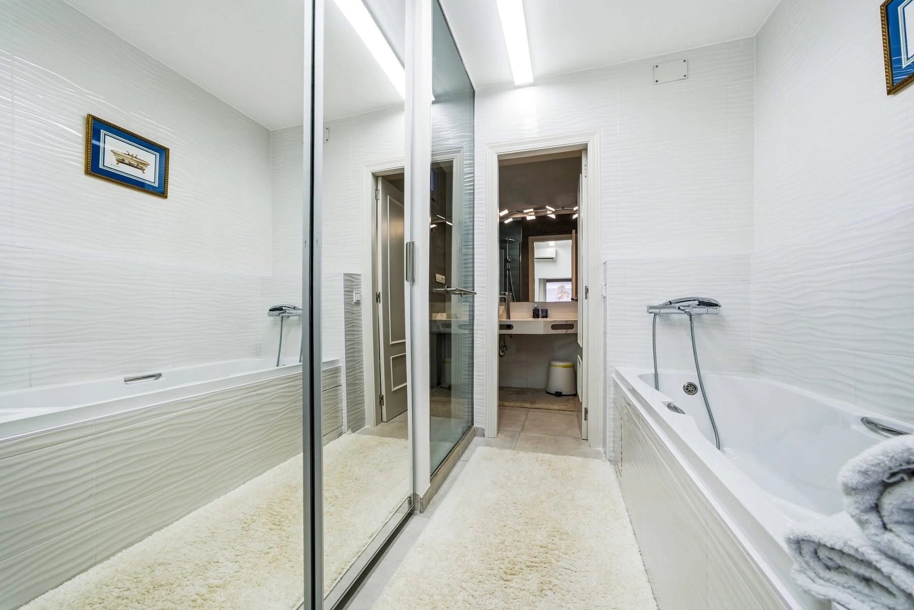 Elegant townhouse with panoramic sea views and dual terraces for sale in Altea Hills.