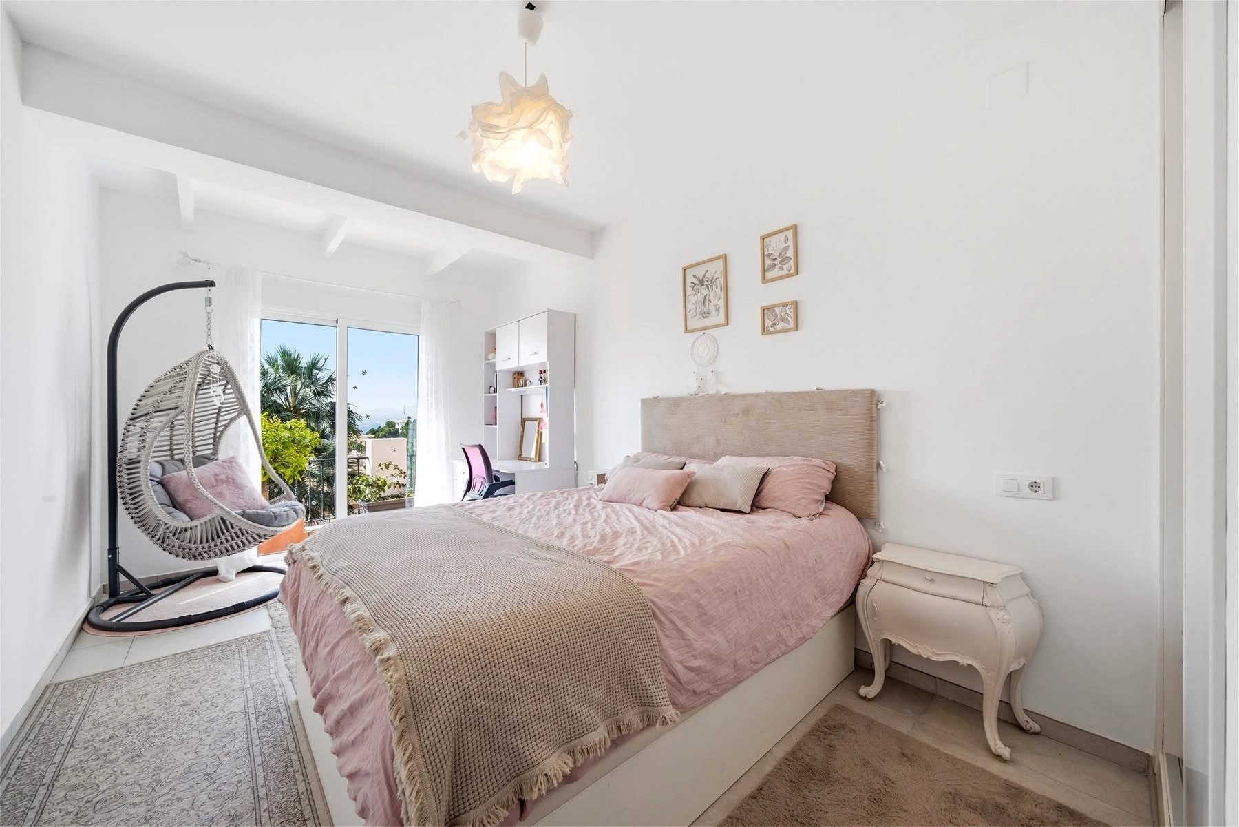 Elegant townhouse with panoramic sea views and dual terraces for sale in Altea Hills.