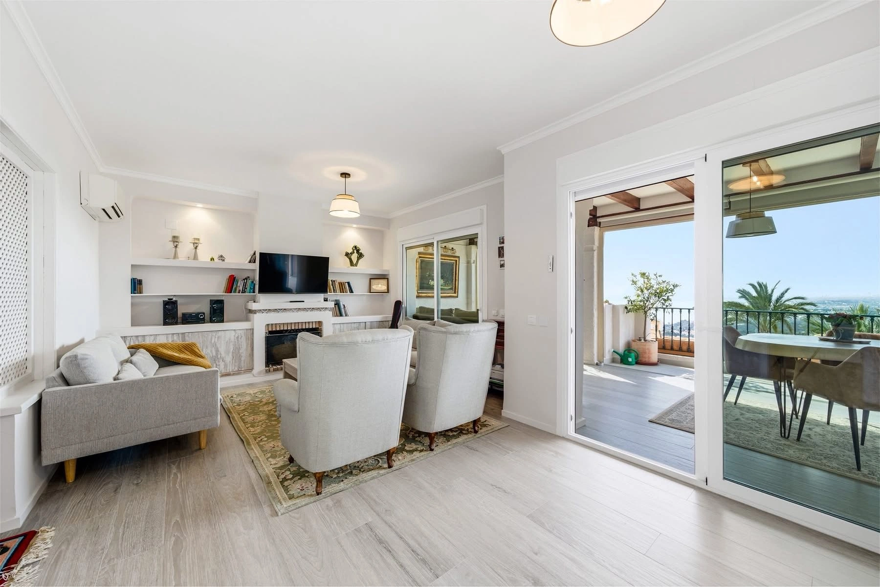 Elegant townhouse with panoramic sea views and dual terraces for sale in Altea Hills.