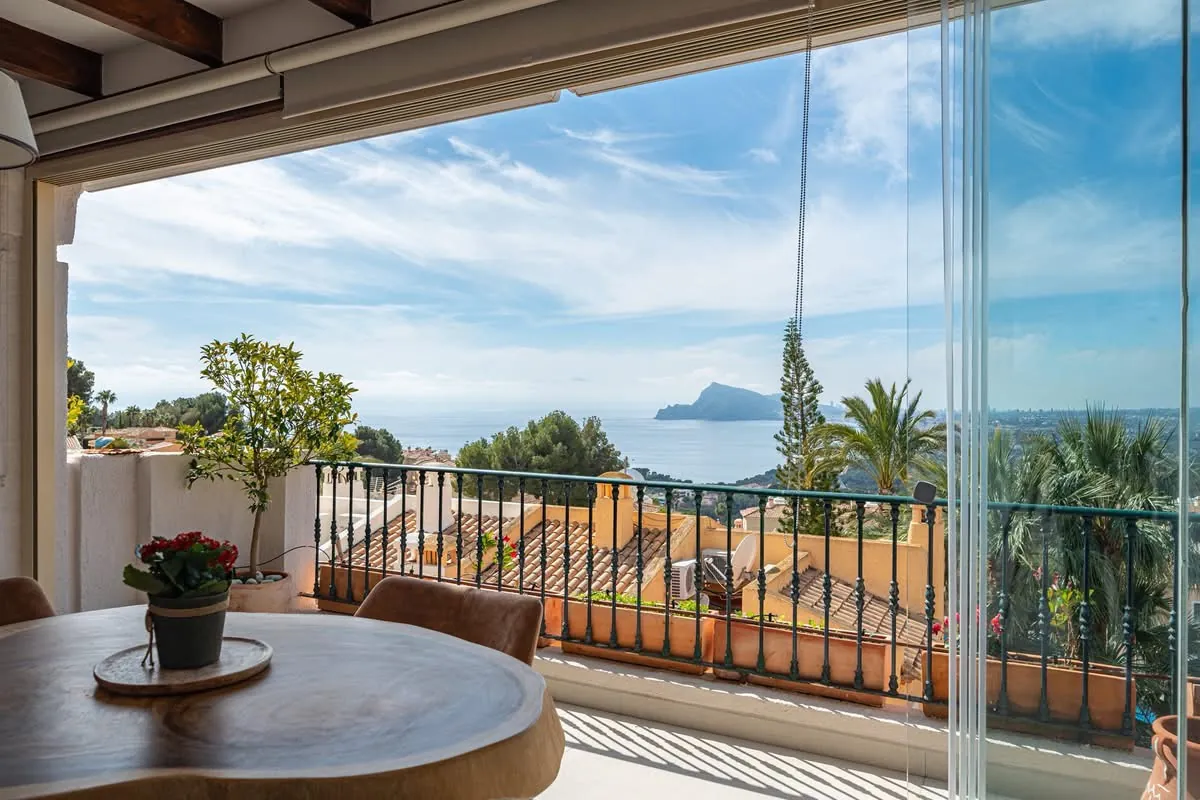 Elegant townhouse with panoramic sea views and dual terraces for sale in Altea Hills.
