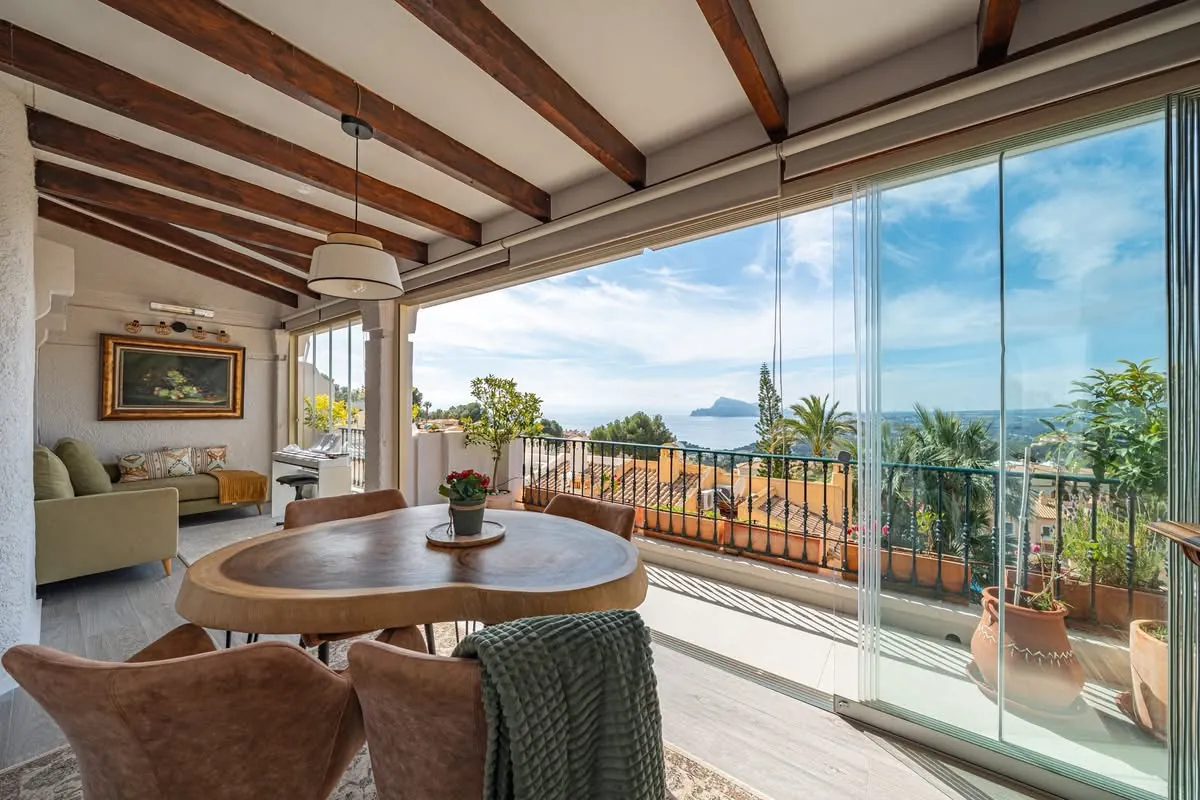 Elegant townhouse with panoramic sea views and dual terraces for sale in Altea Hills.