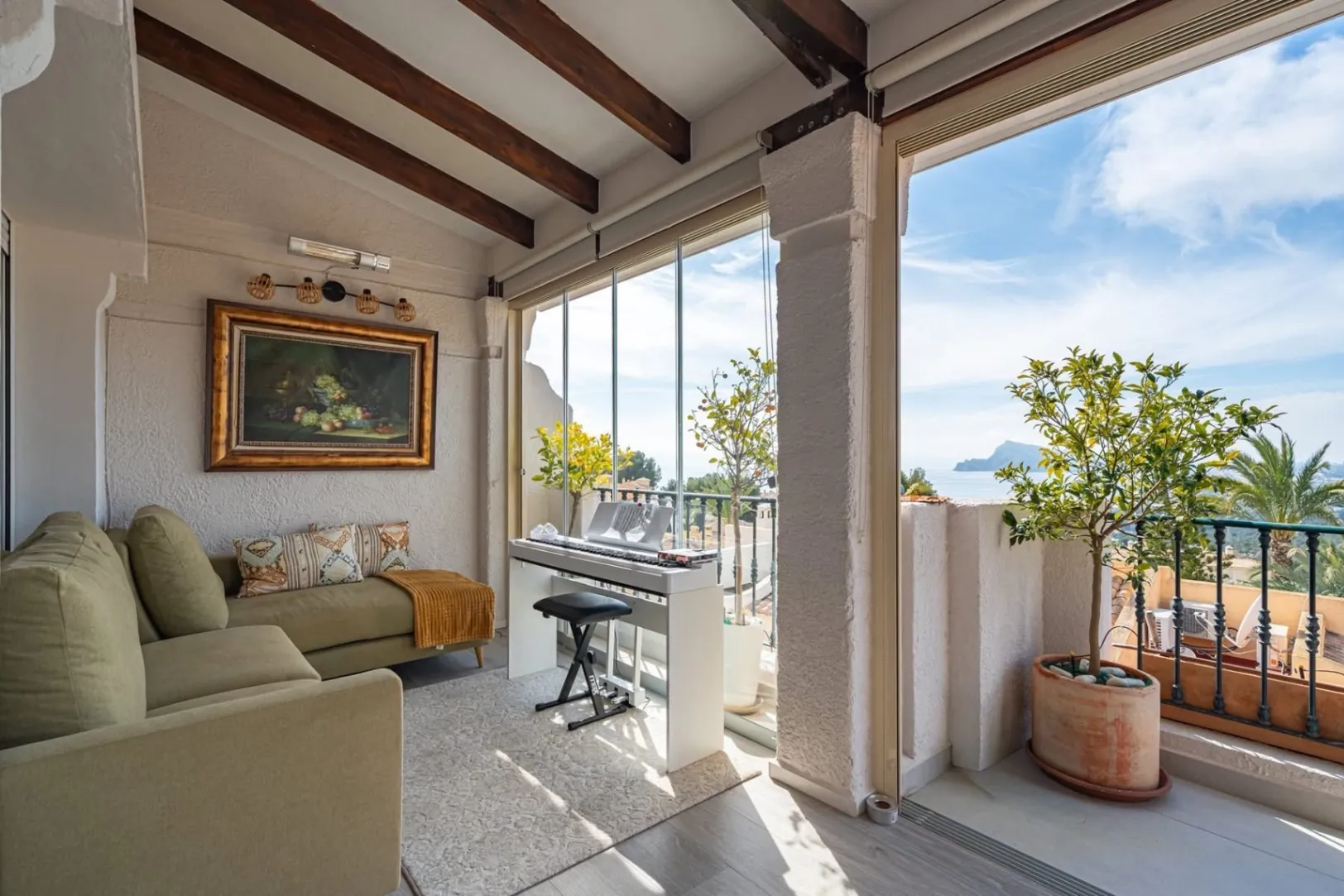 Elegant townhouse with panoramic sea views and dual terraces for sale in Altea Hills.