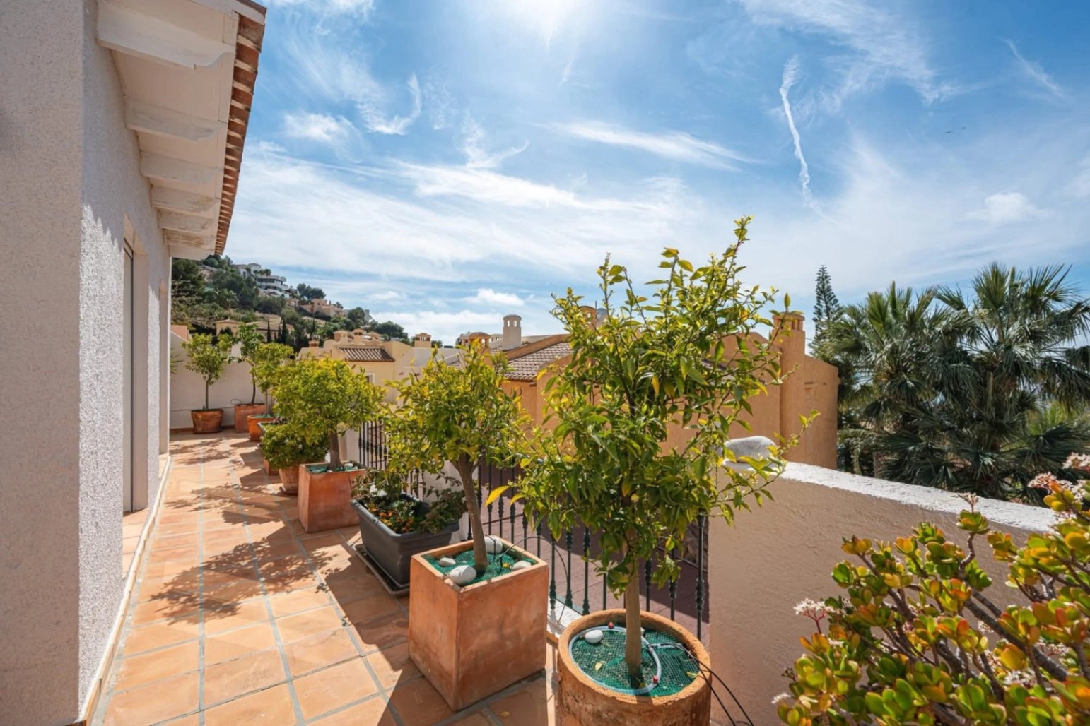 Elegant townhouse with panoramic sea views and dual terraces for sale in Altea Hills.