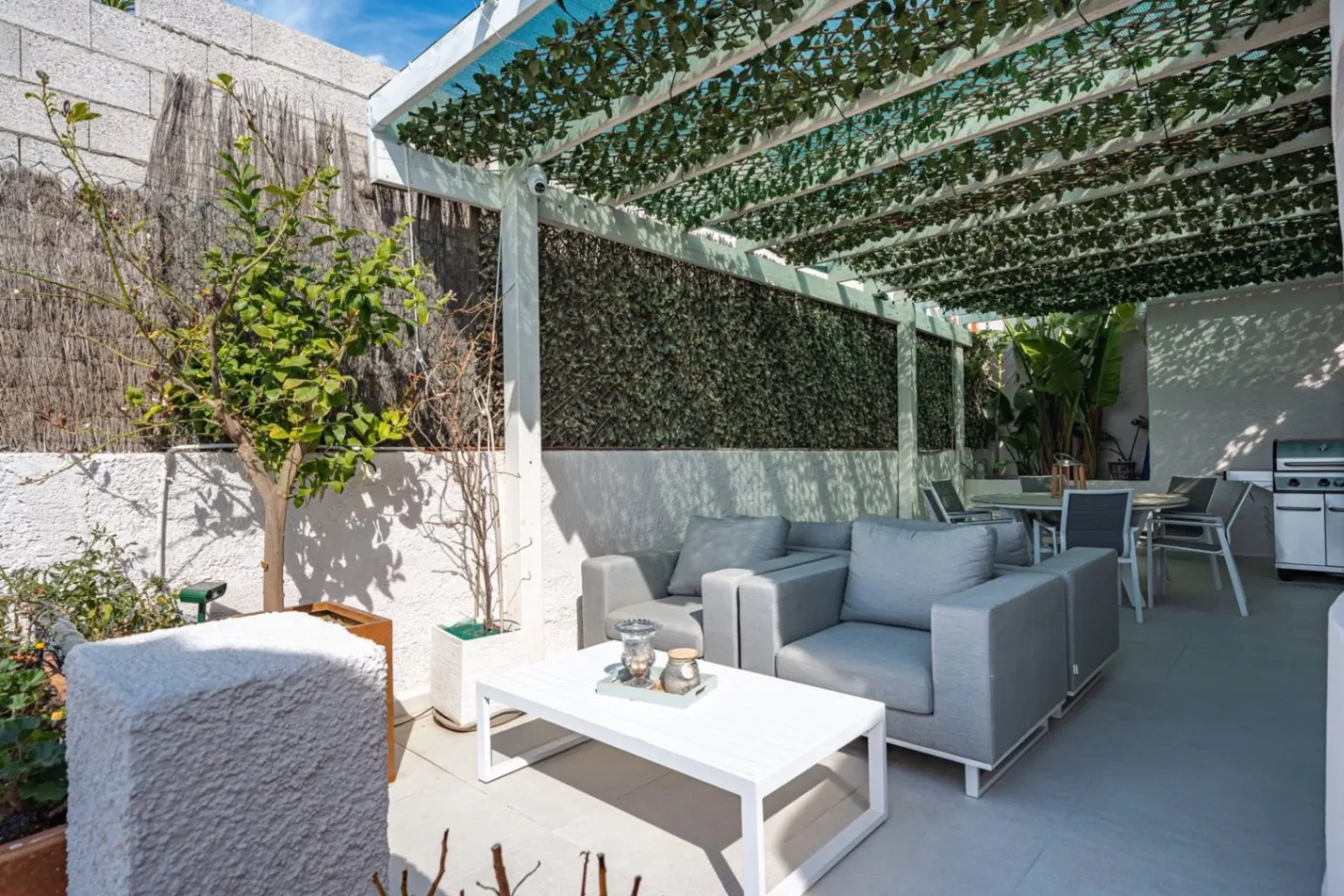 Elegant townhouse with panoramic sea views and dual terraces for sale in Altea Hills.
