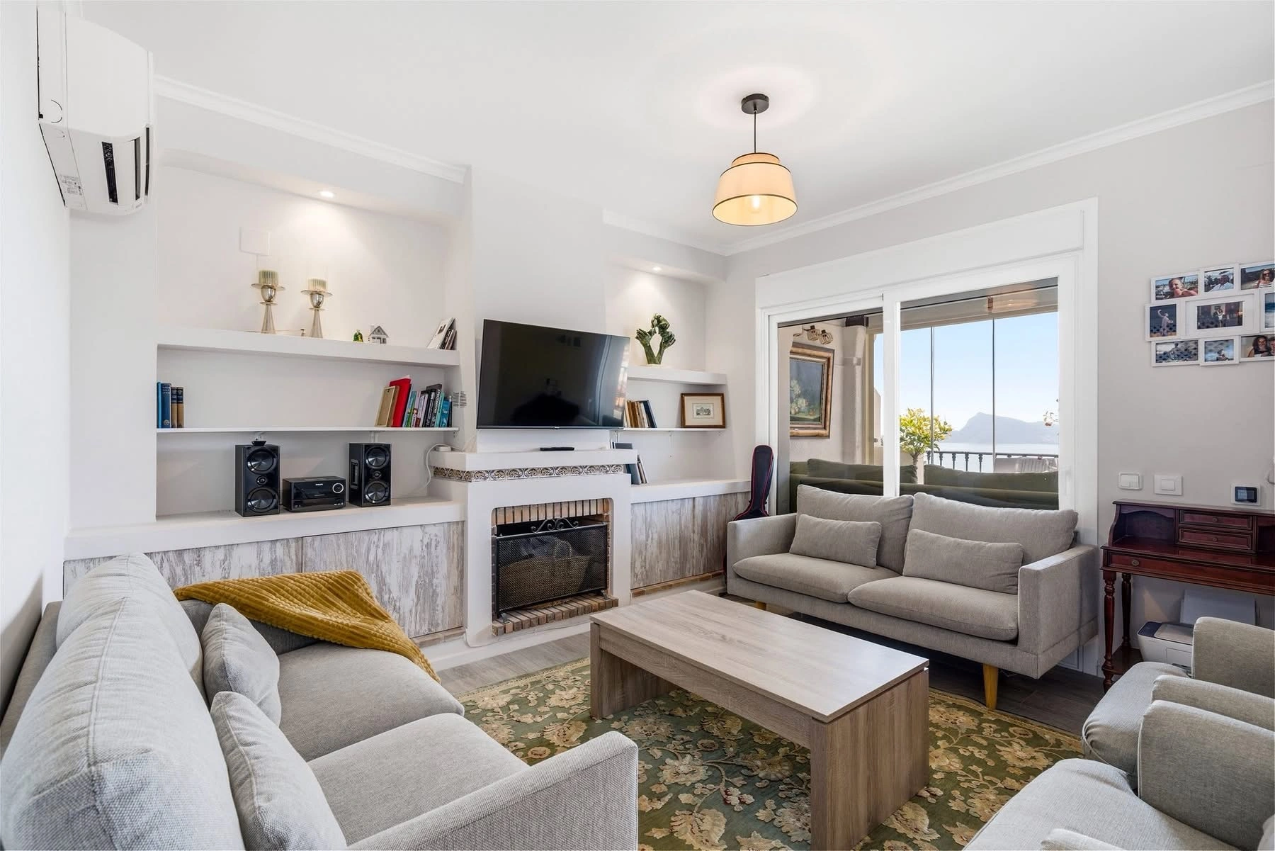 Elegant townhouse with panoramic sea views and dual terraces for sale in Altea Hills.