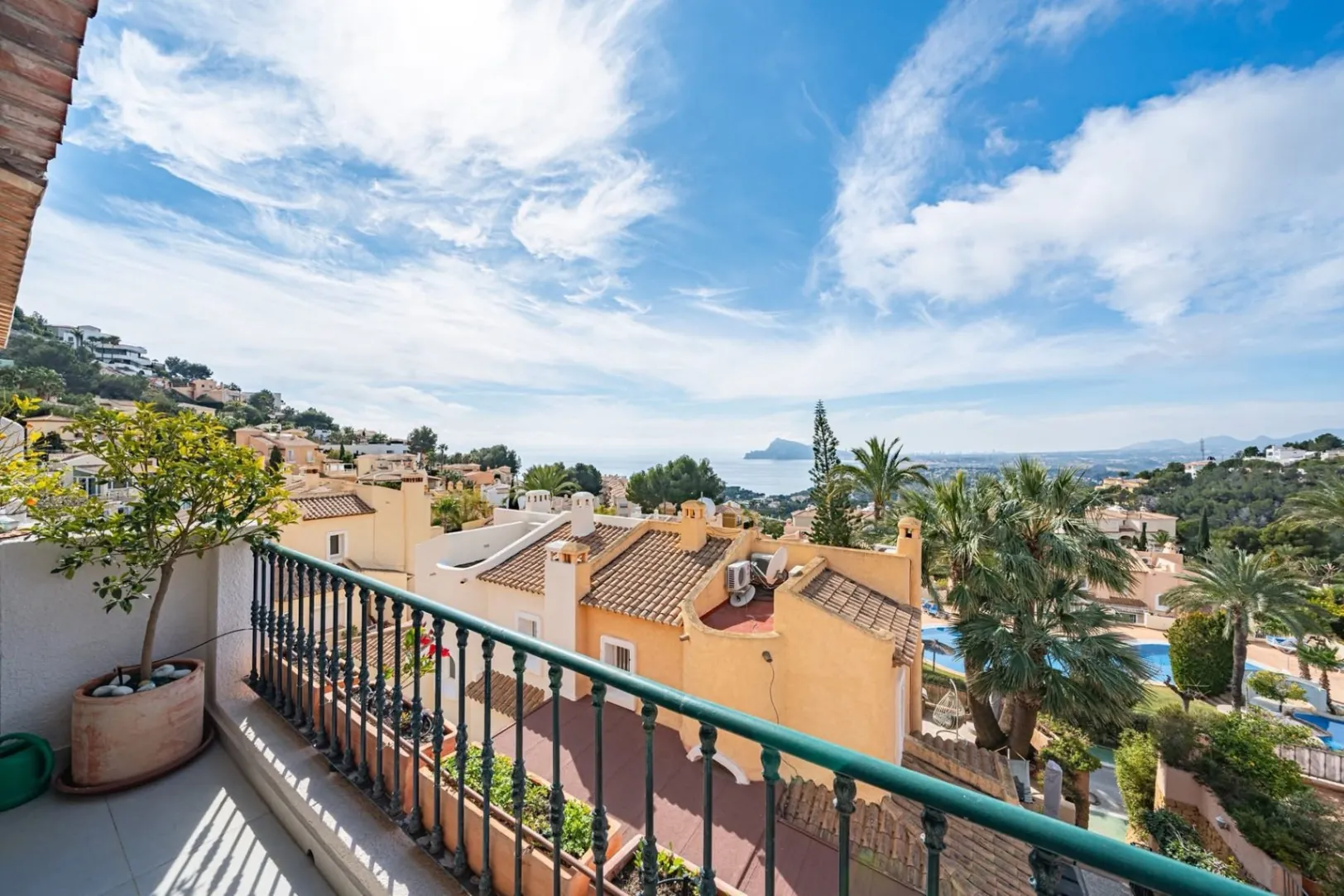 Elegant townhouse with panoramic sea views and dual terraces for sale in Altea Hills.