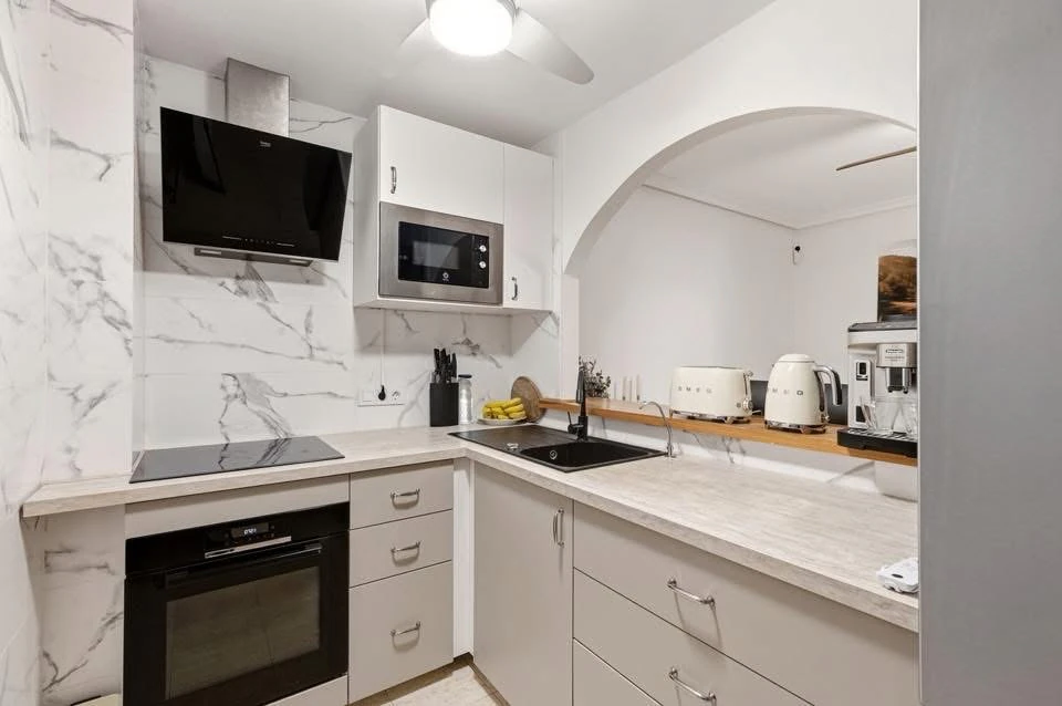 Apartament bine situat aproape de plajă, cu un excelent potențial de închiriere, de vânzare în Villajoyosa.