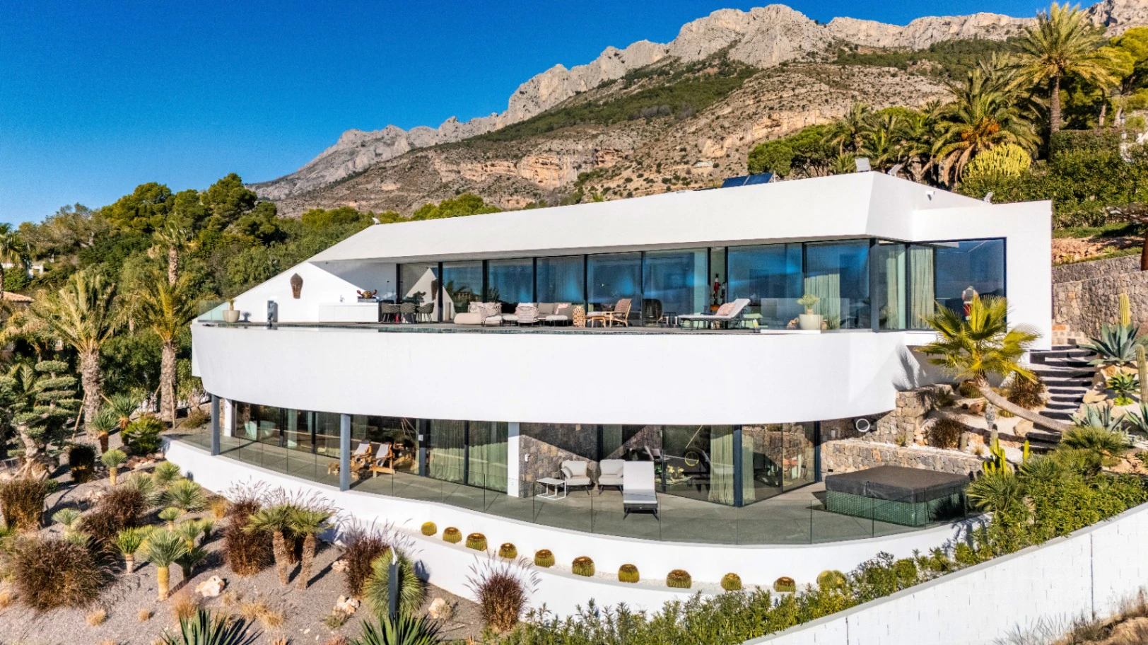 Contemporary curved villa with panoramic sea views in Altea, Costa Blanca