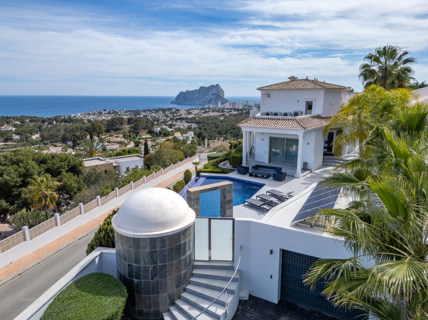Spectacular luxury villa with large windows offering panoramic sea views in Benissa Costa.