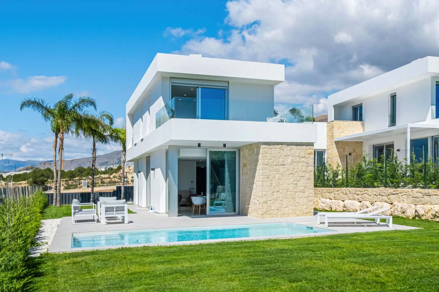Newly built modern villa with private plot and pool in an exclusive development in Sierra Cortina, Finestrat, Costa Blanca.