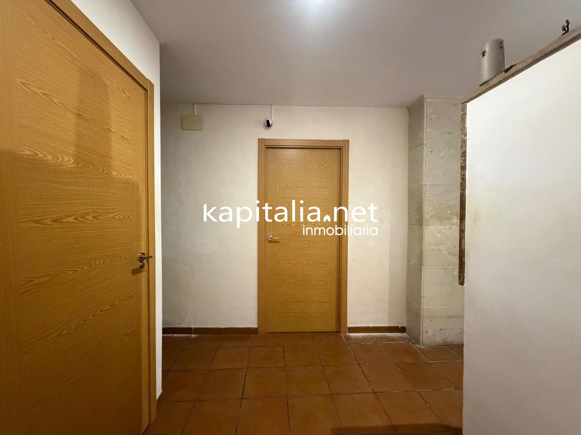 10203 - Vivienda en planta baja con bodega en sótano
