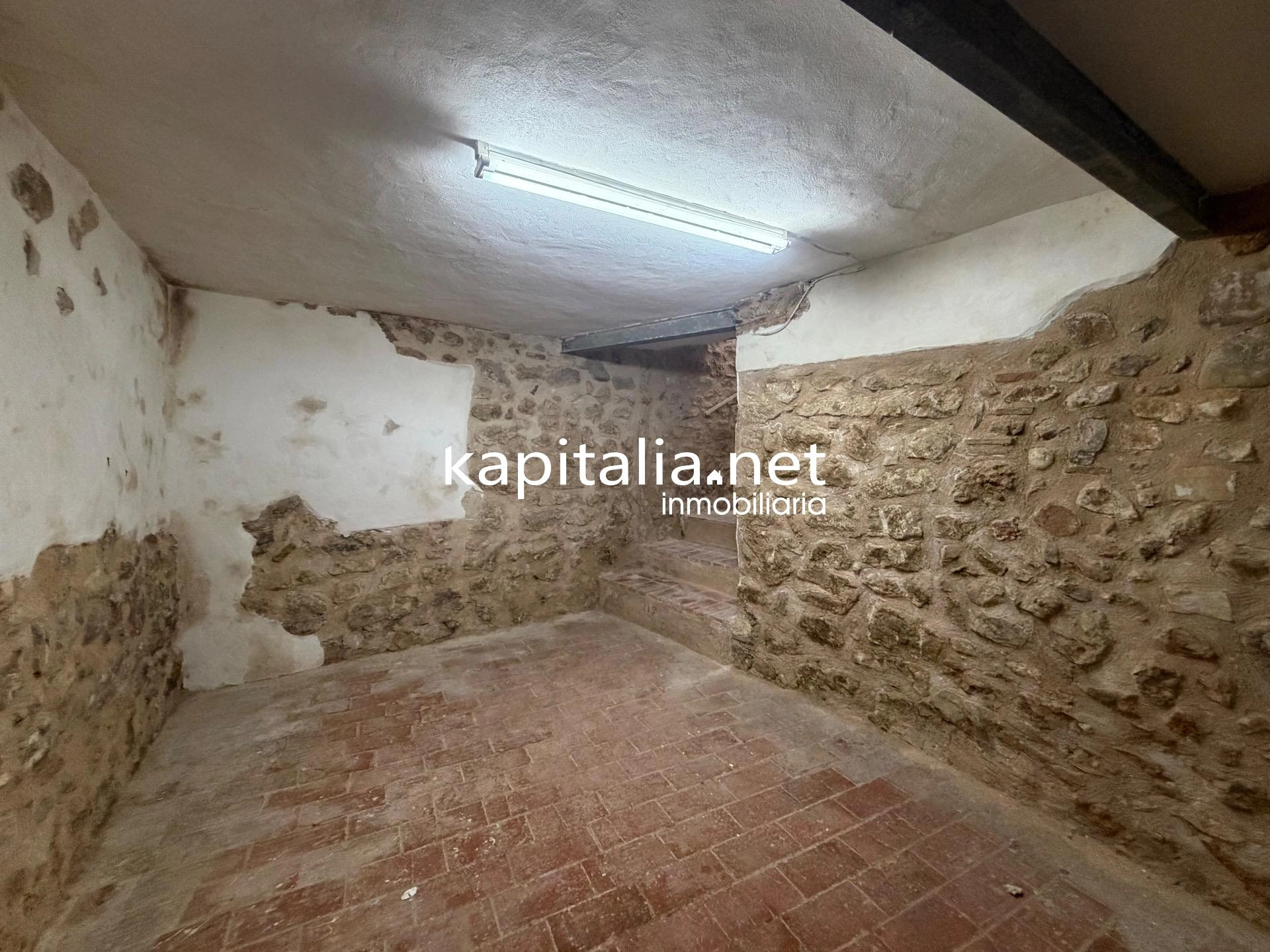 10203 - Vivienda en planta baja con bodega en sótano