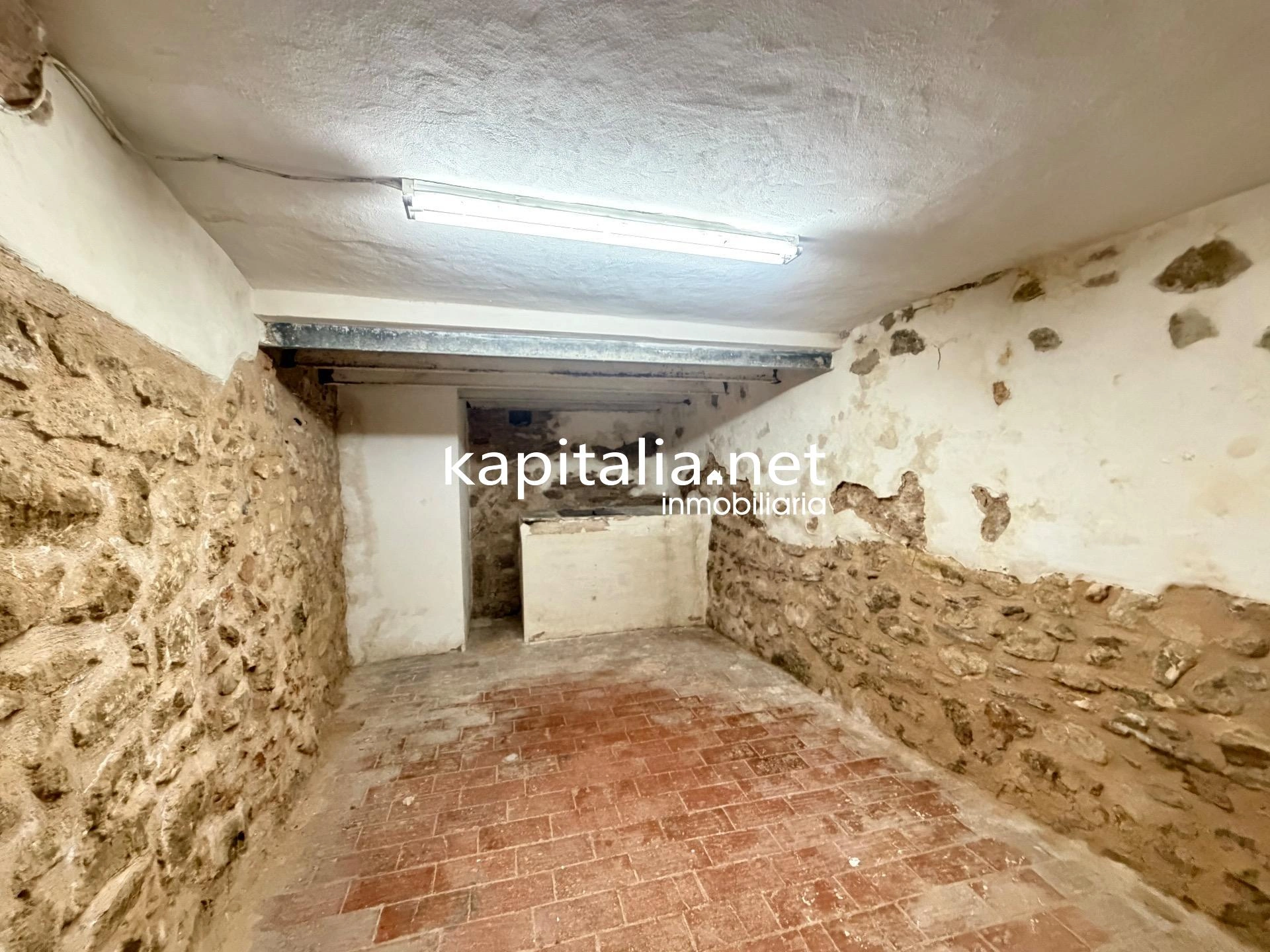 10203 - Vivienda en planta baja con bodega en sótano