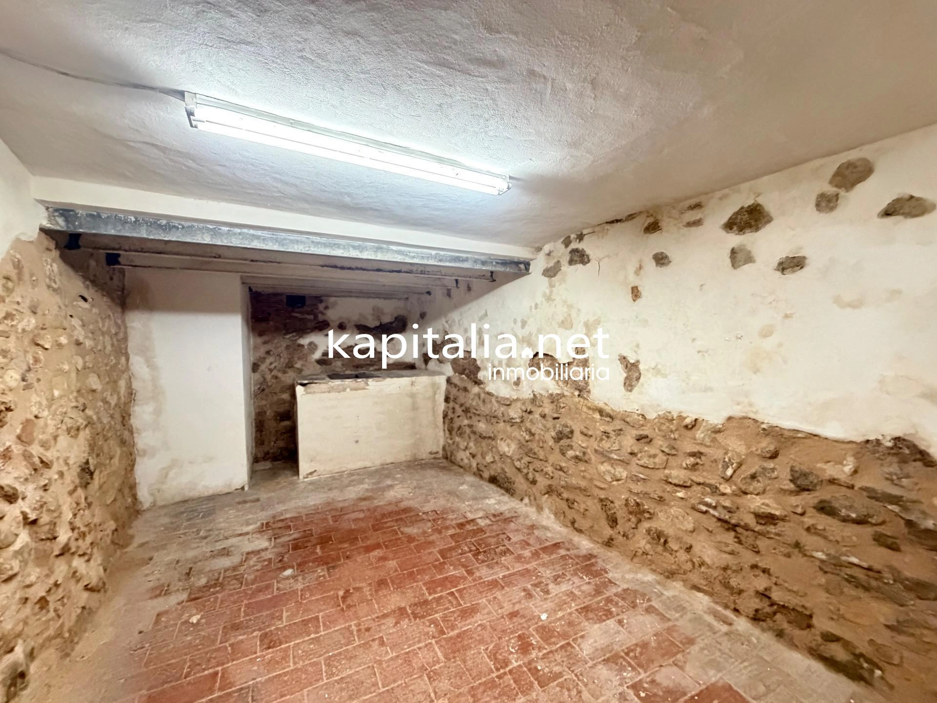 10203 - Vivienda en planta baja con bodega en sótano