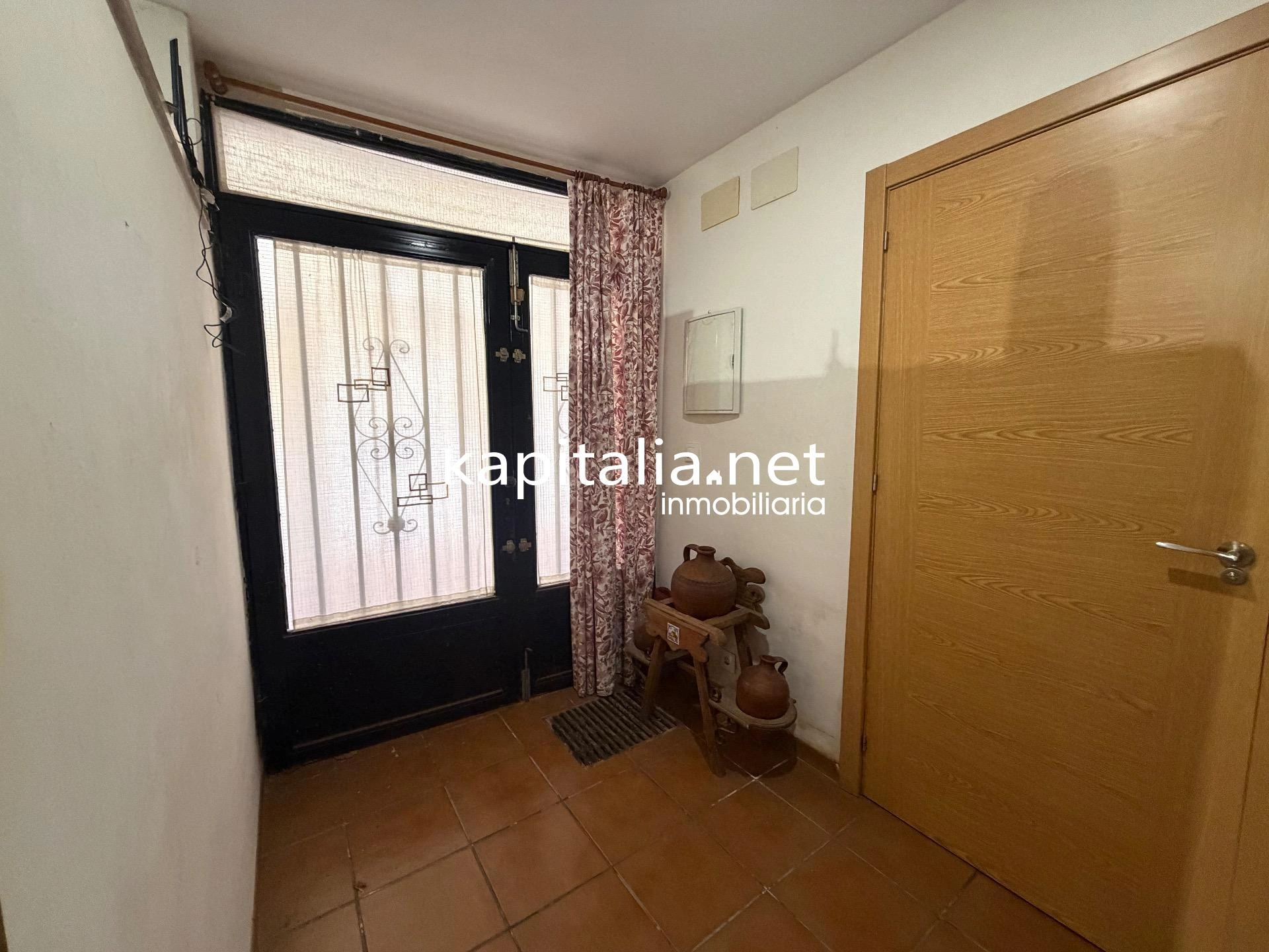 10203 - Vivienda en planta baja con bodega en sótano