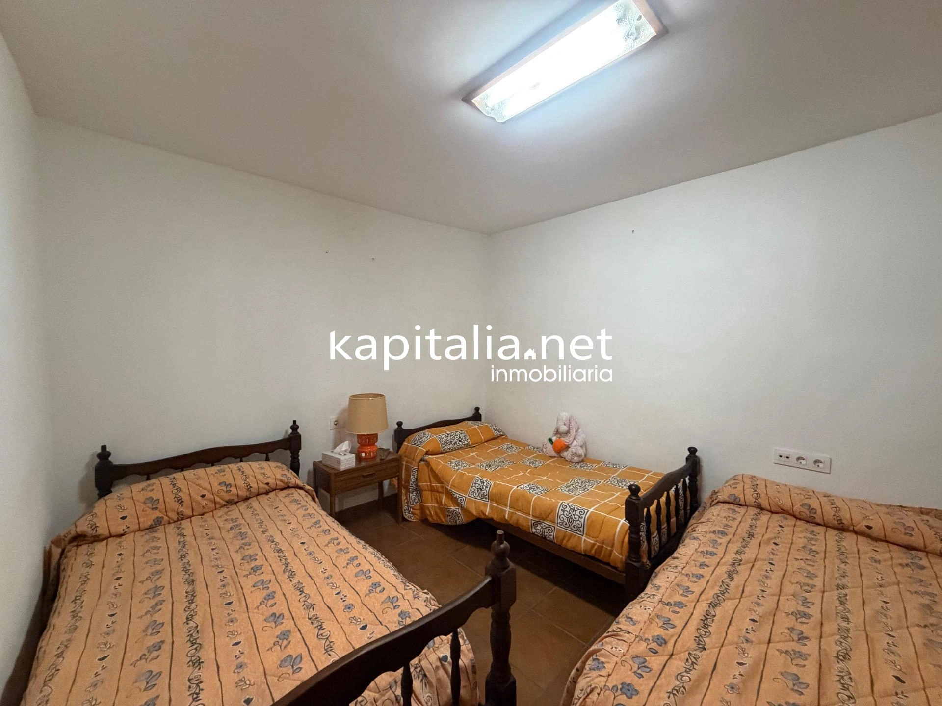 10203 - Vivienda en planta baja con bodega en sótano