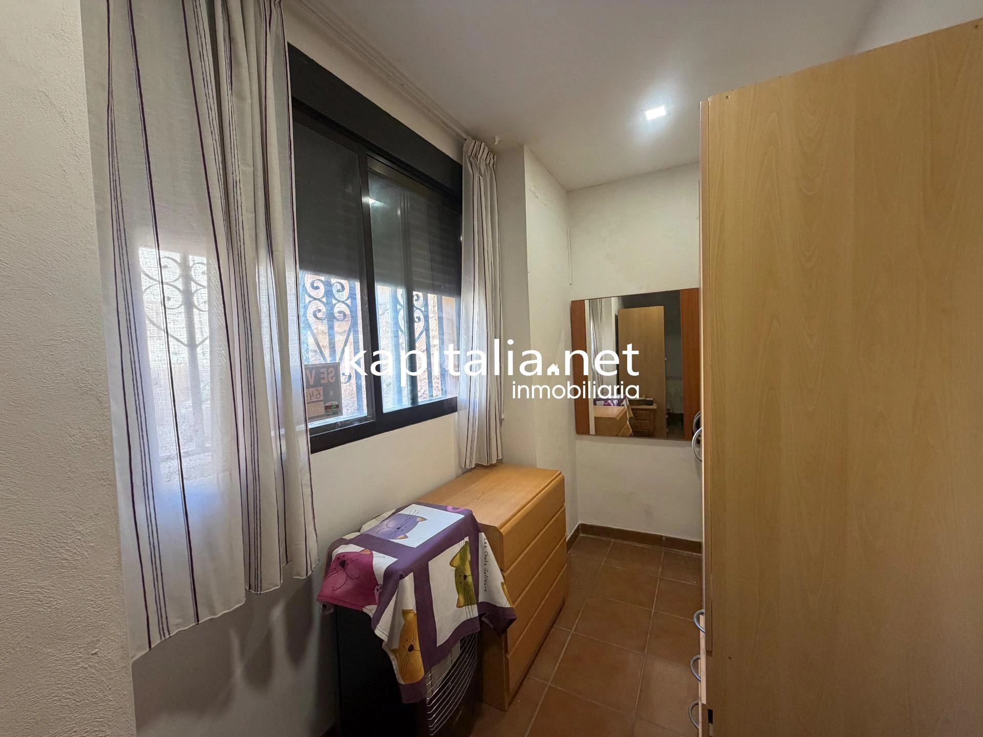 10203 - Vivienda en planta baja con bodega en sótano
