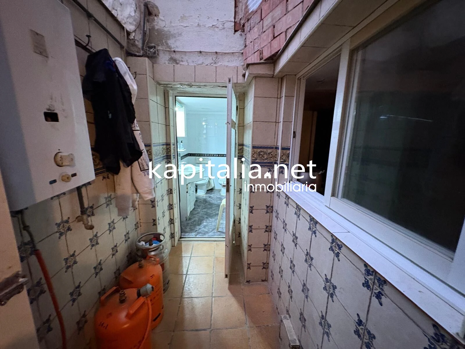 CASA CON GARAJE A LA VENTA EN XATIVA