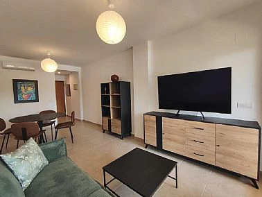 Apartamento junto a una estupenda playa de arena en el corazón de la playa de Las Marinas de Dénia,