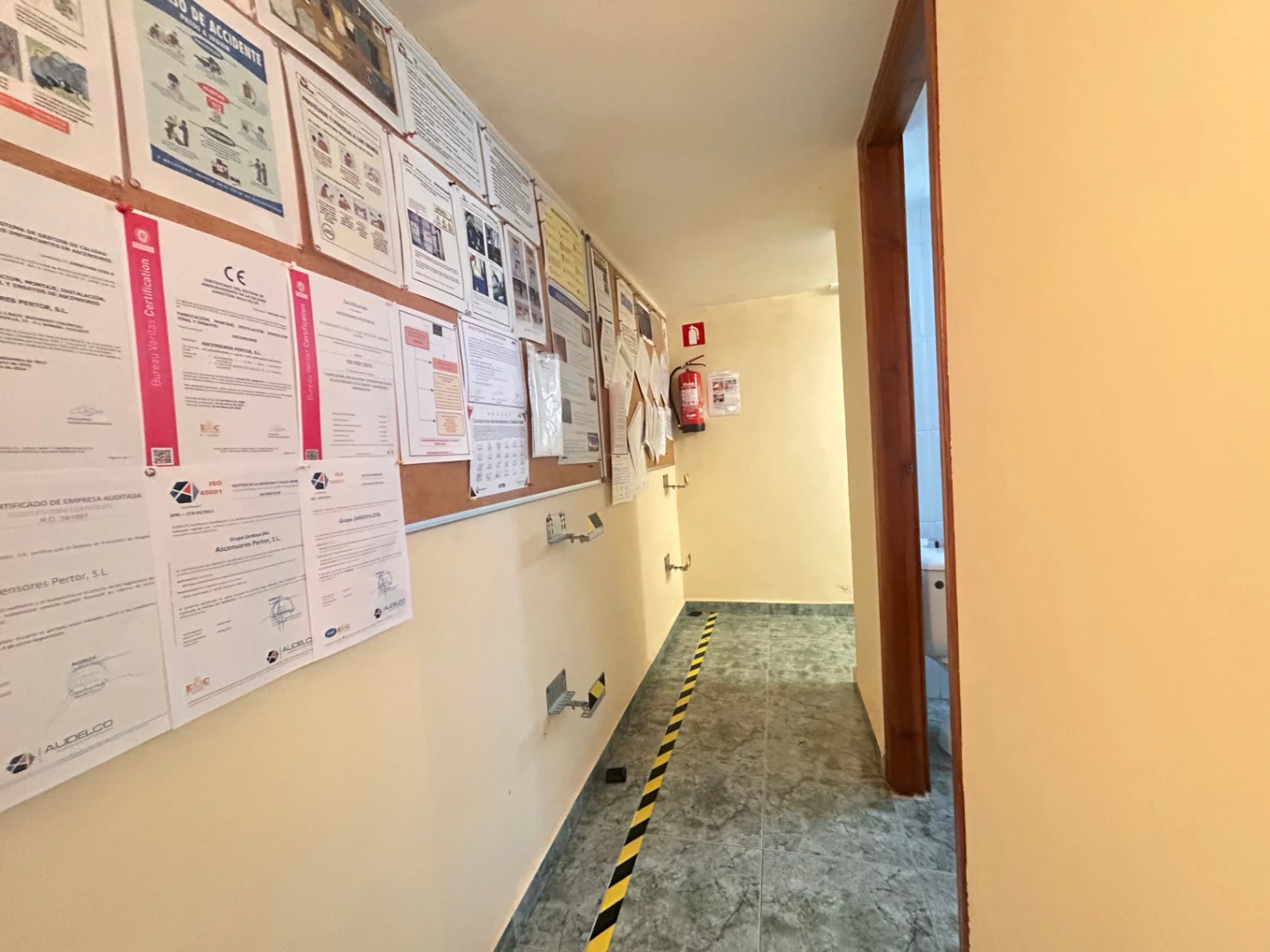 Commercial premises with a large storage area and shop at street level.