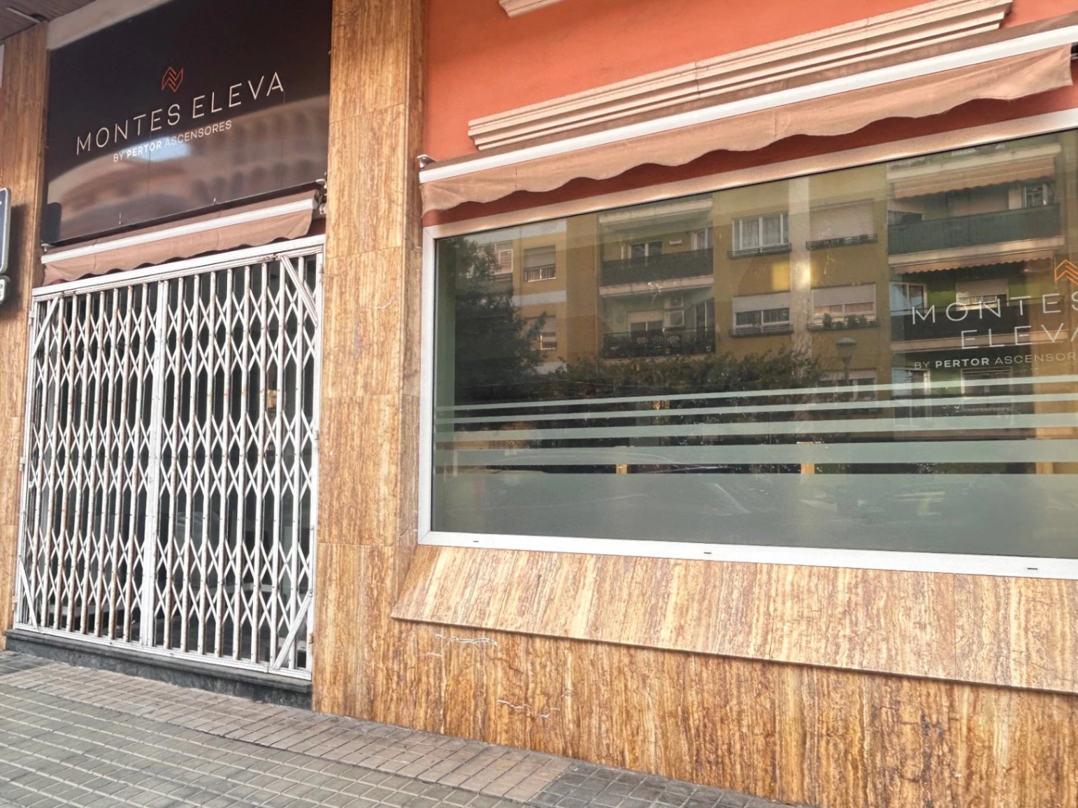 Commercial premises with a large storage area and shop at street level.