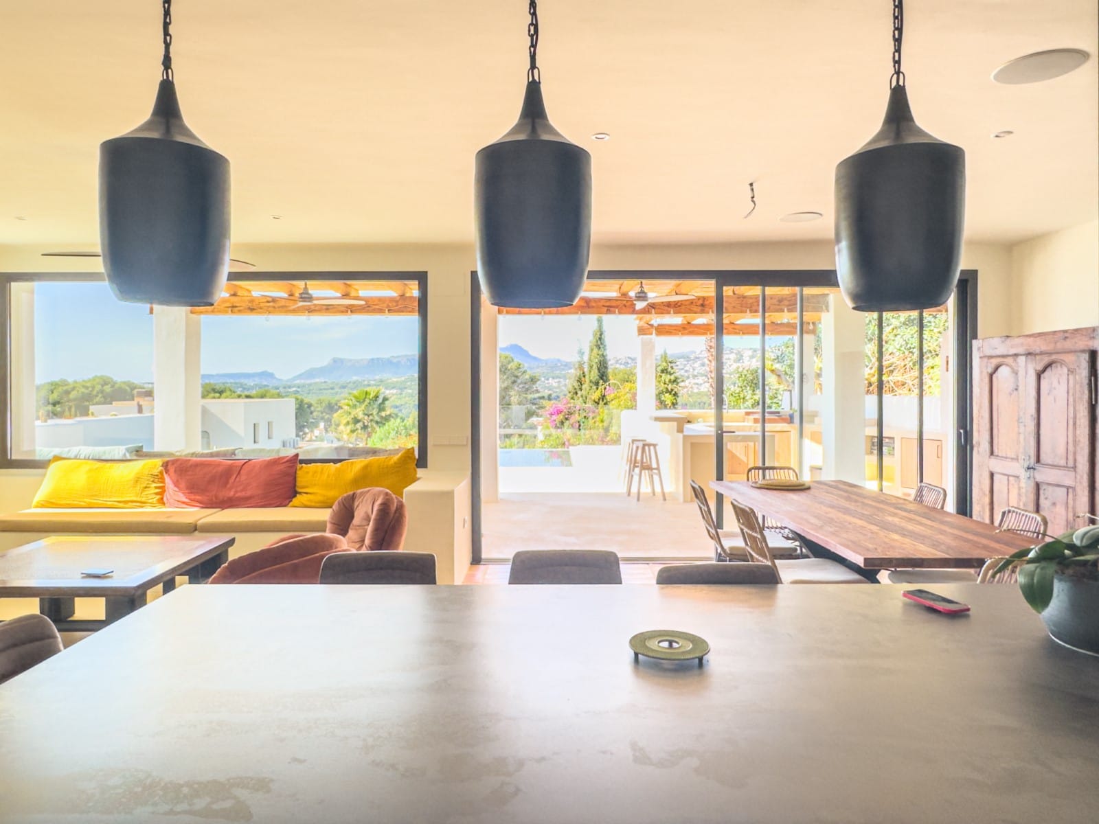 Ibizan-style villa with sea views for sale in Moraira, near El Portet and the Moraira Center.