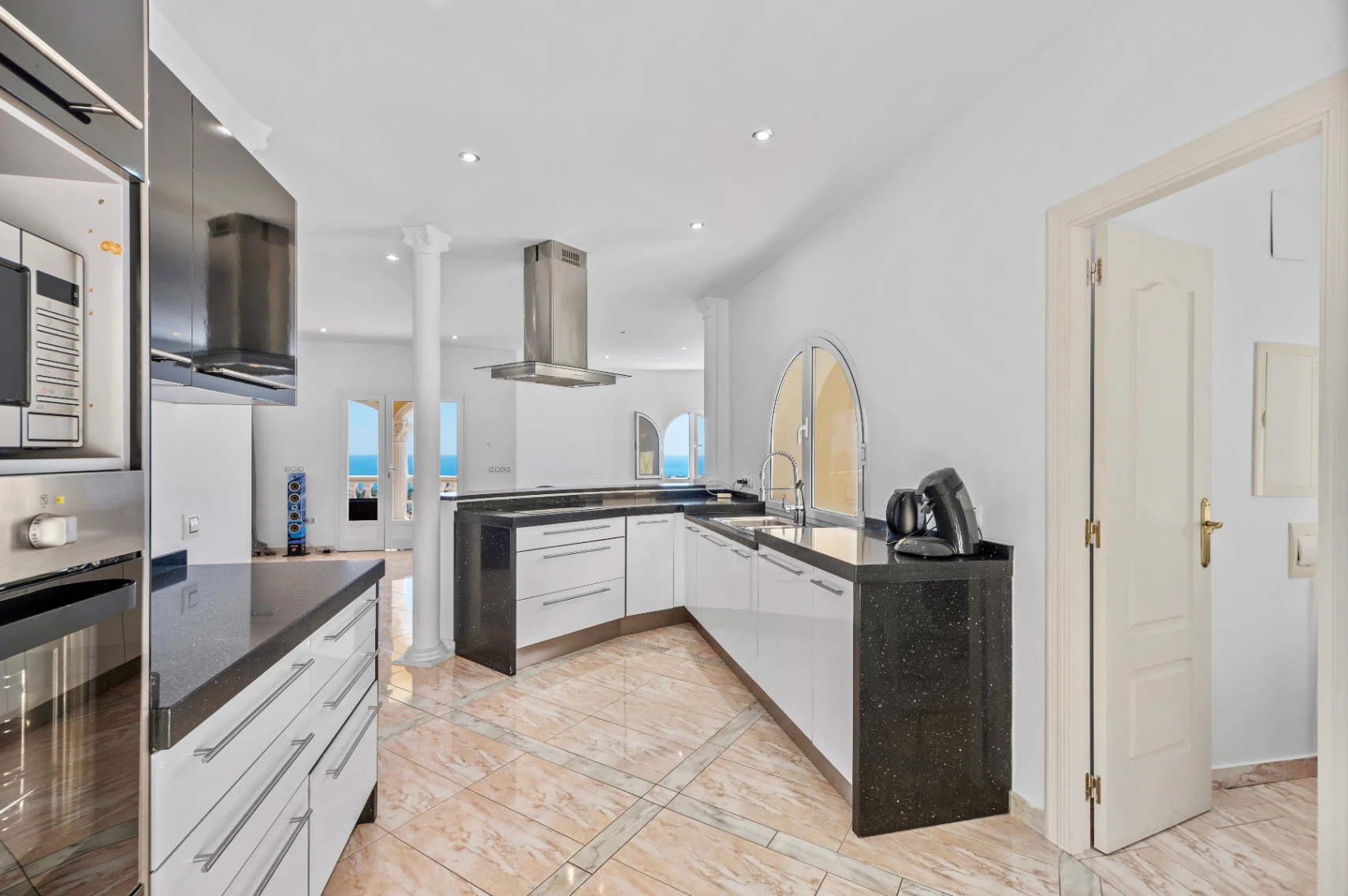 STUNNING MEDITERRANEAN VILLA FOR SALE IN CALPE WITH PANORAMIC SEA AND MOUNTAIN VIEWS