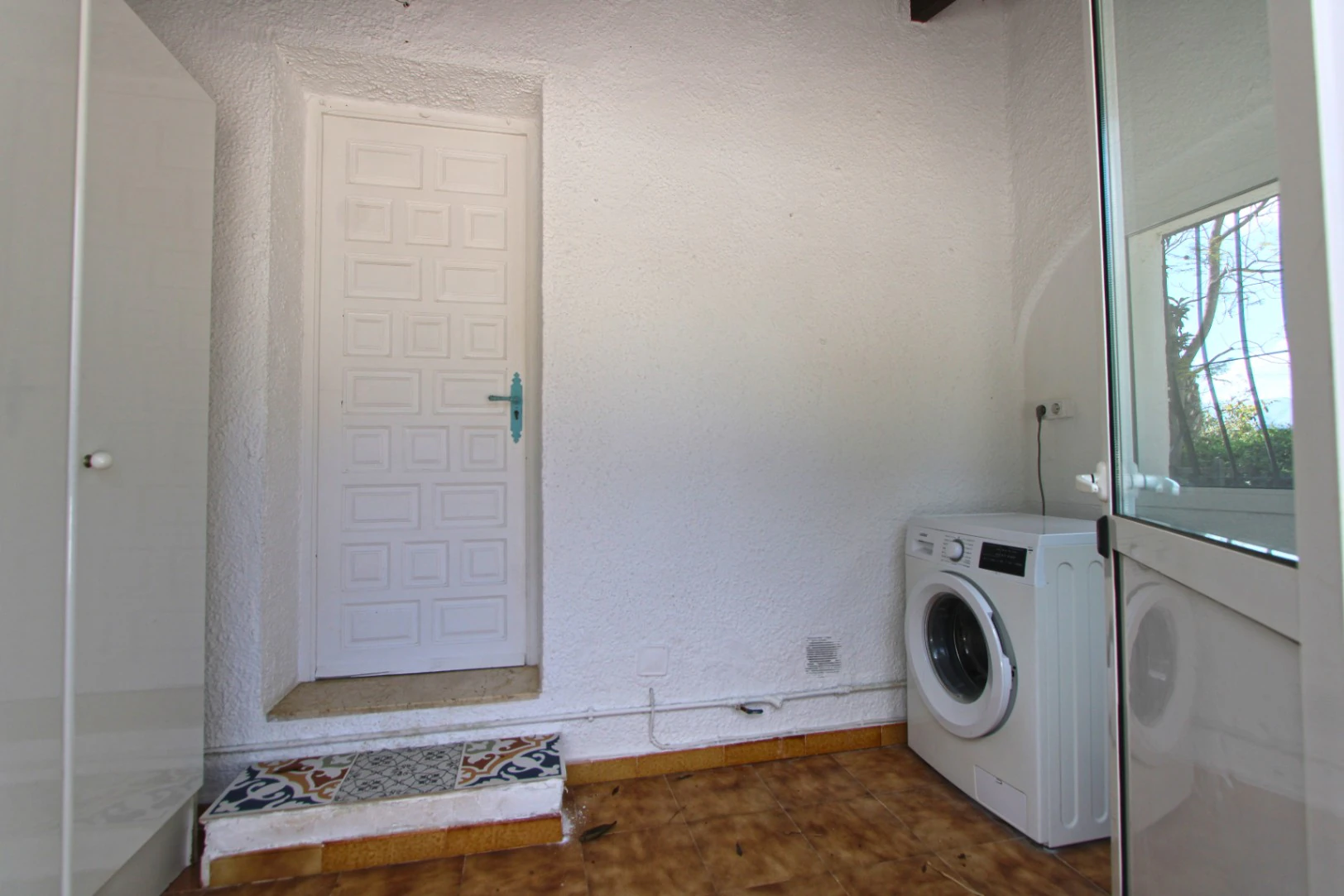 Chalet a la venta situado en una parcela llana en Orba