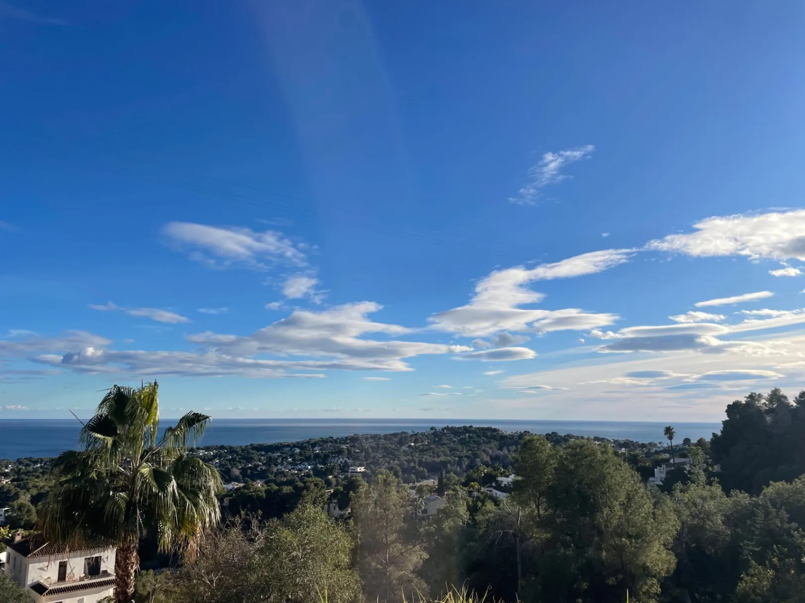 Grondstuk met zeezicht te koop in Benimeit, Moraira
