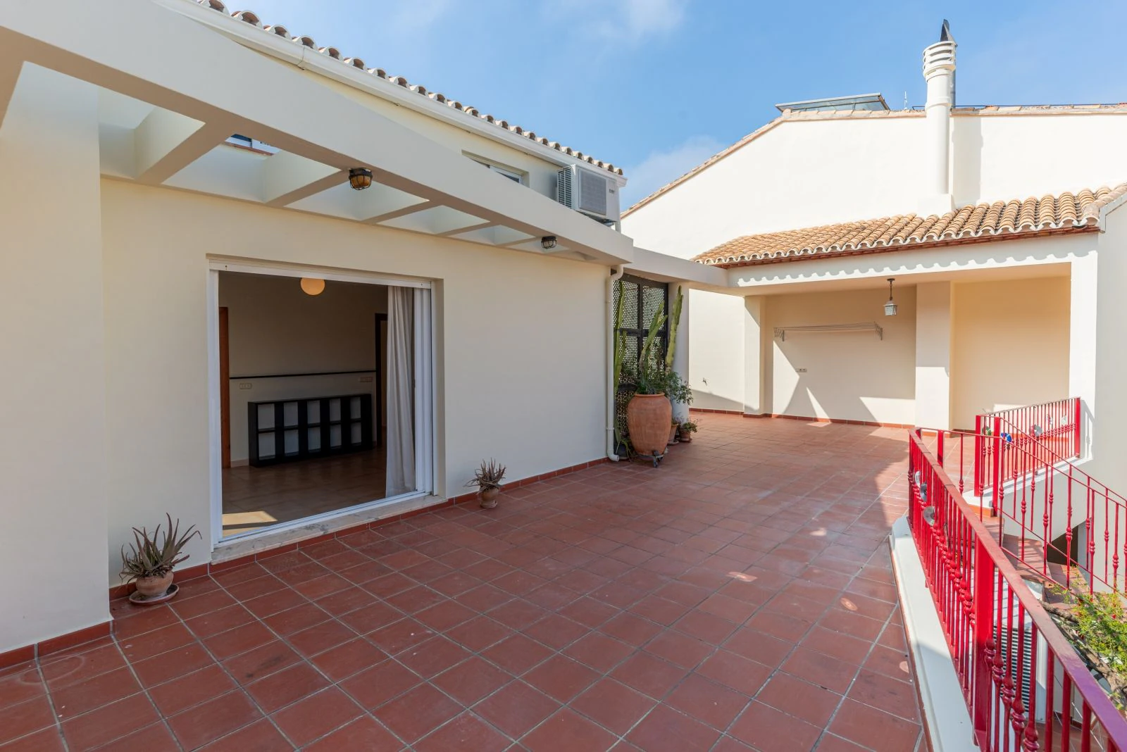 Spectacular village house with a large patio, barbecue, and garage.
