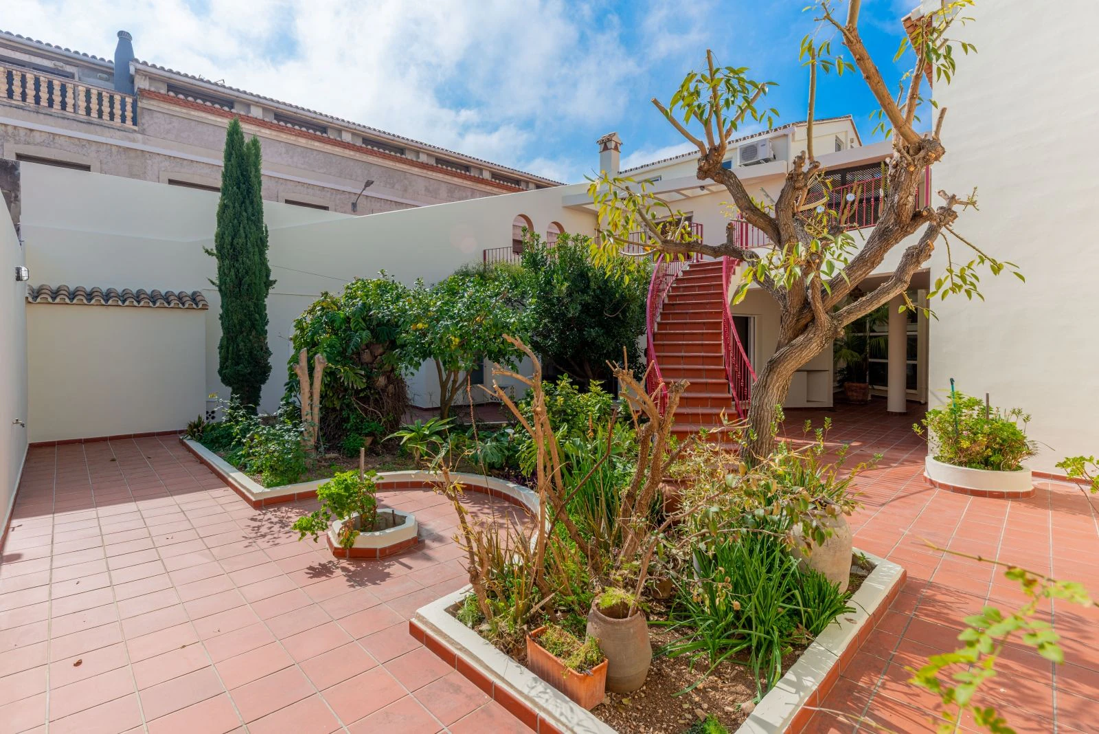 Spectacular village house with a large patio, barbecue, and garage.